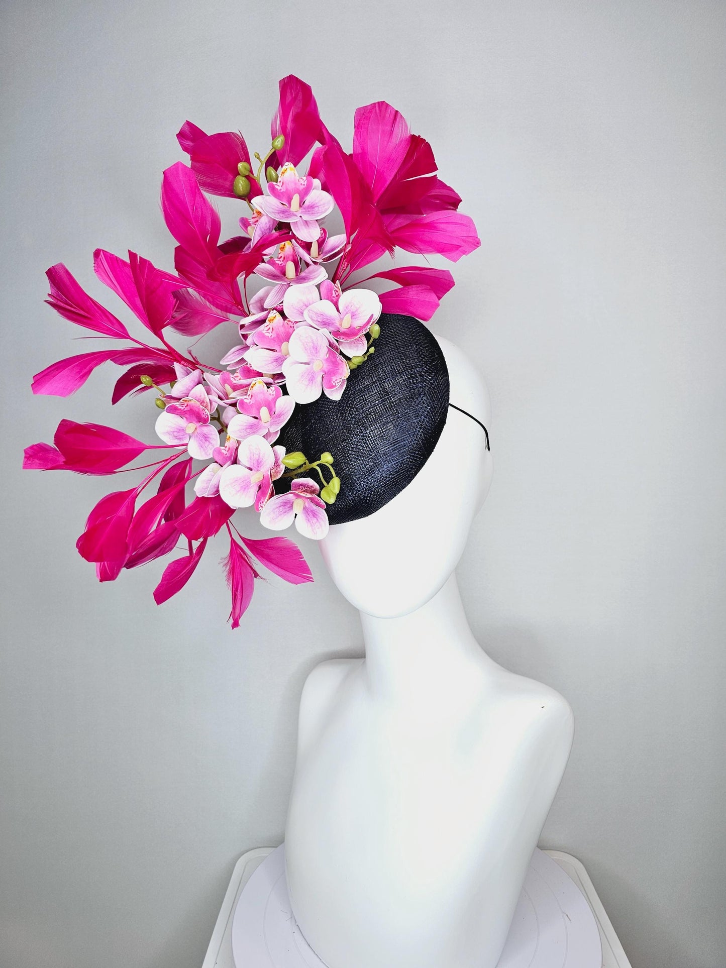kentucky derby hat fascinator navy blue sinamay with white and blush pink satin orchid flowers and hot pink branching feathers