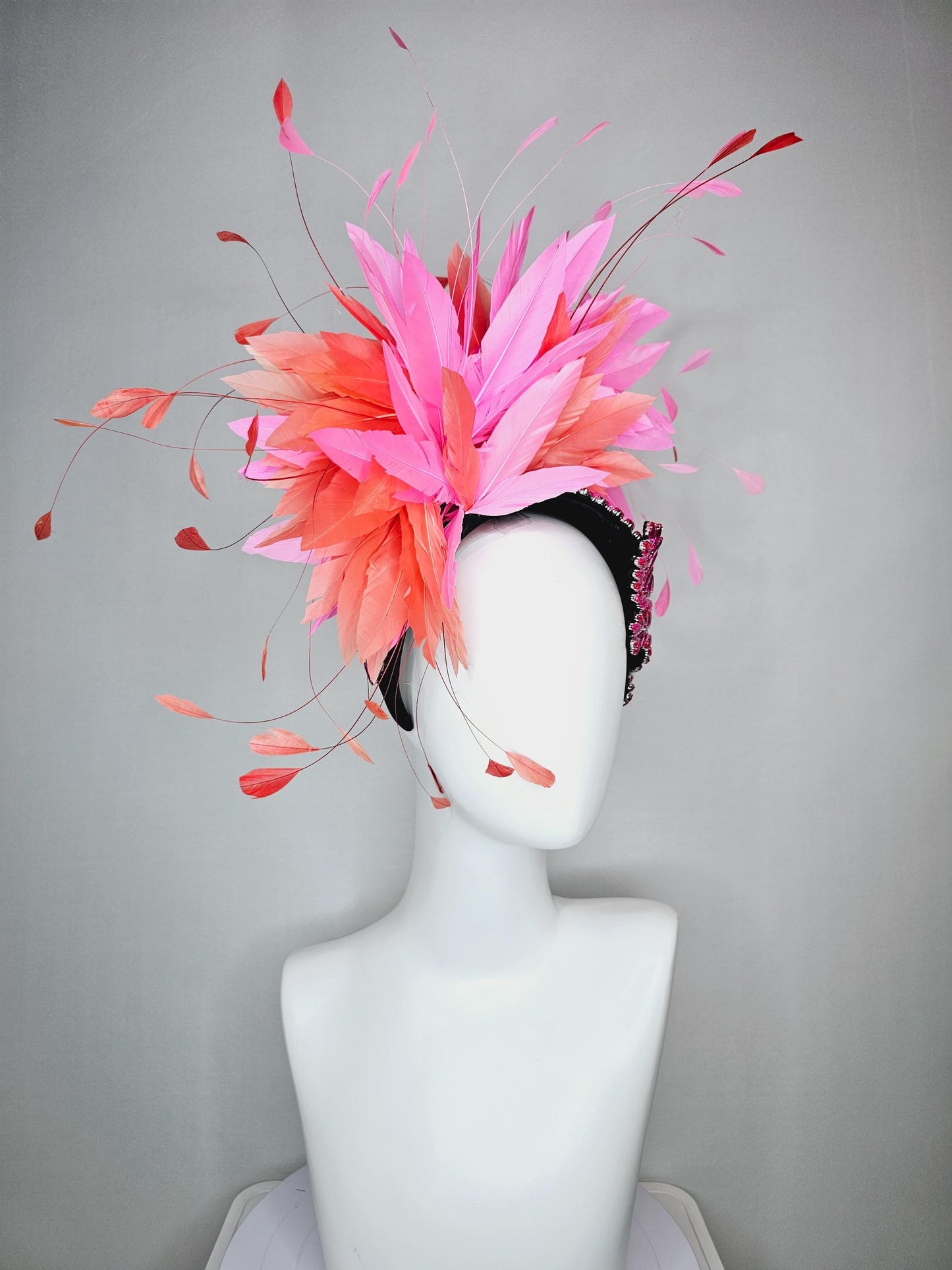 kentucky derby hat fascinator black headband with large pink crystal rhinestone beaded stems and blush pink coral orange branching feathers