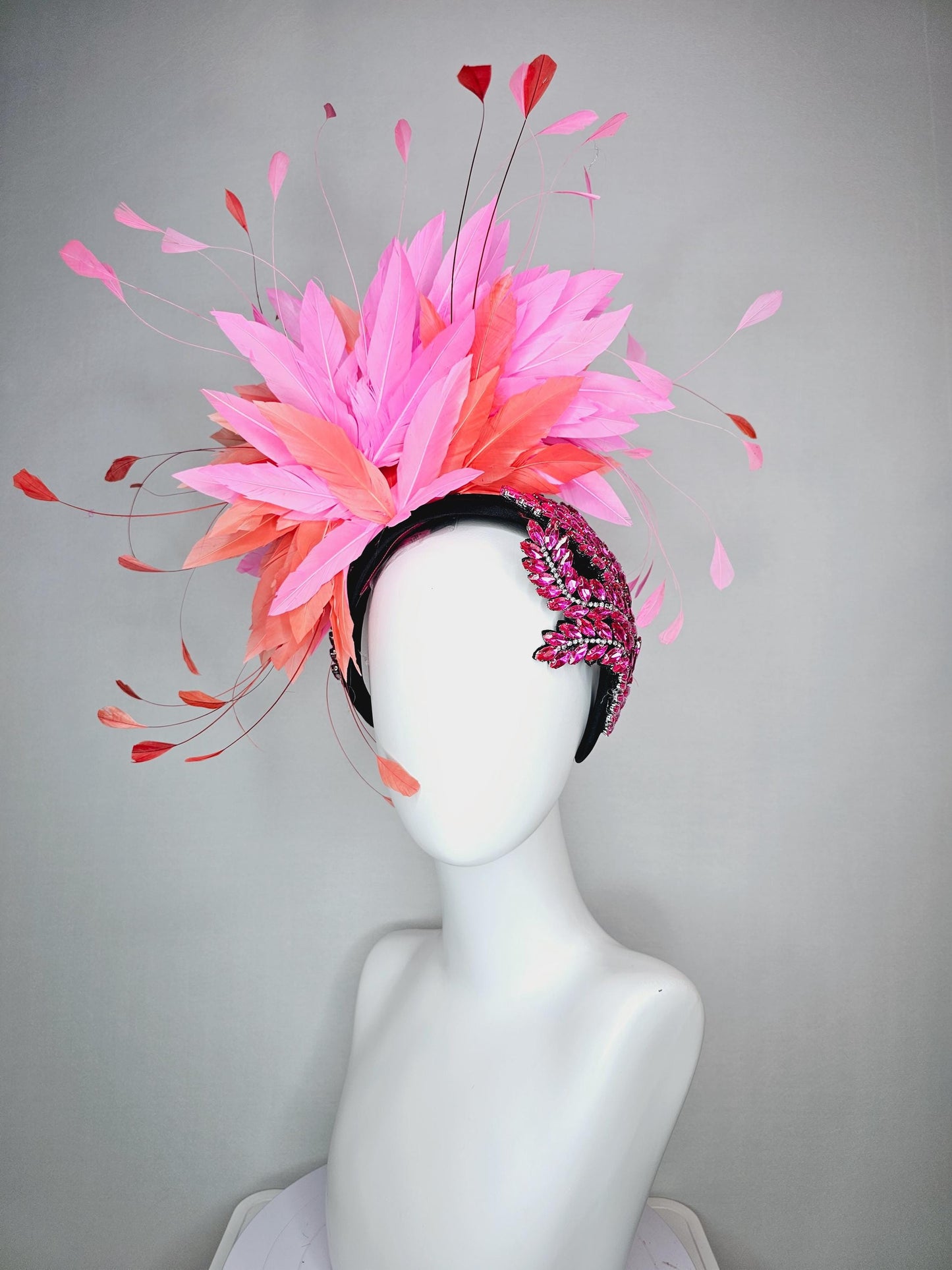 kentucky derby hat fascinator black headband with large pink crystal rhinestone beaded stems and blush pink coral orange branching feathers