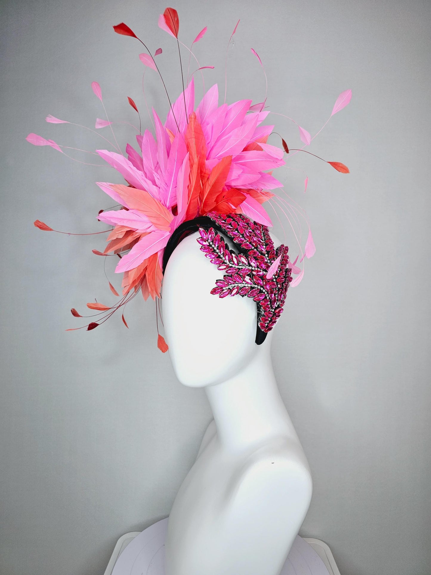kentucky derby hat fascinator black headband with large pink crystal rhinestone beaded stems and blush pink coral orange branching feathers