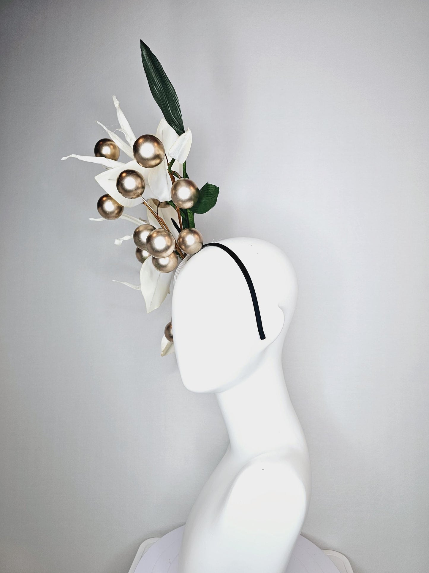 kentucky derby hat fascinator large ivory white satin silk flowers with large dark green leaves and gold pearls