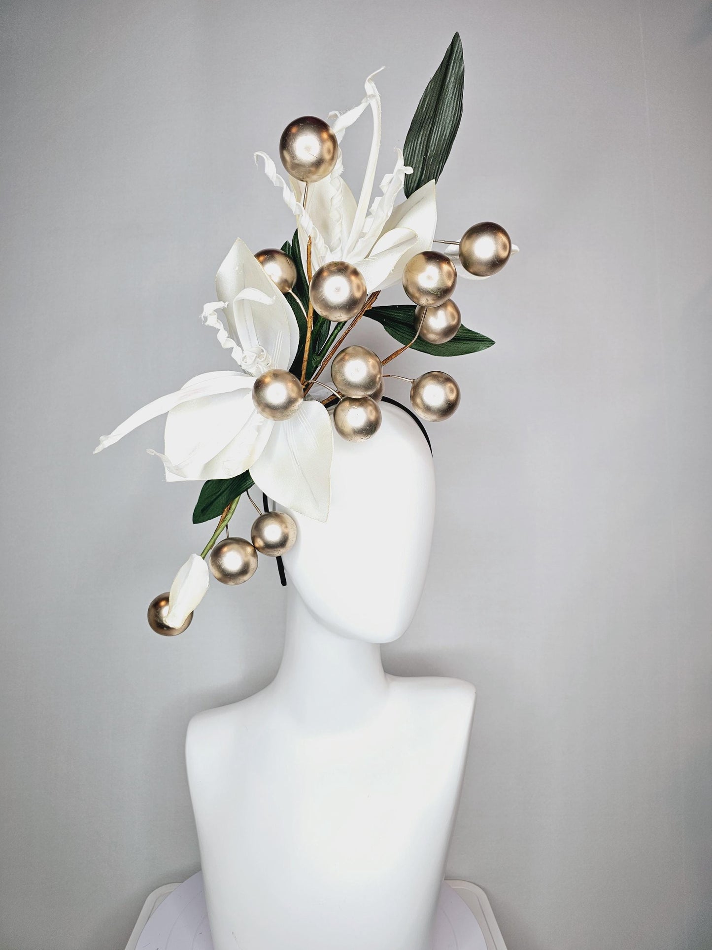 kentucky derby hat fascinator large ivory white satin silk flowers with large dark green leaves and gold pearls