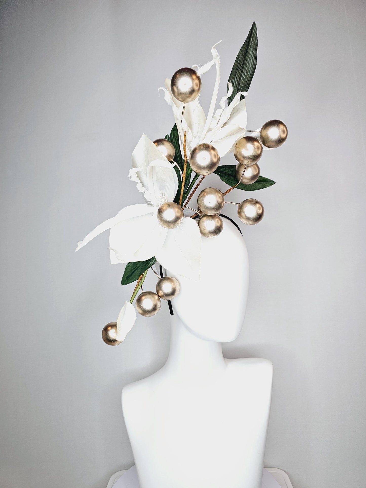 kentucky derby hat fascinator large ivory white satin silk flowers with large dark green leaves and gold pearls