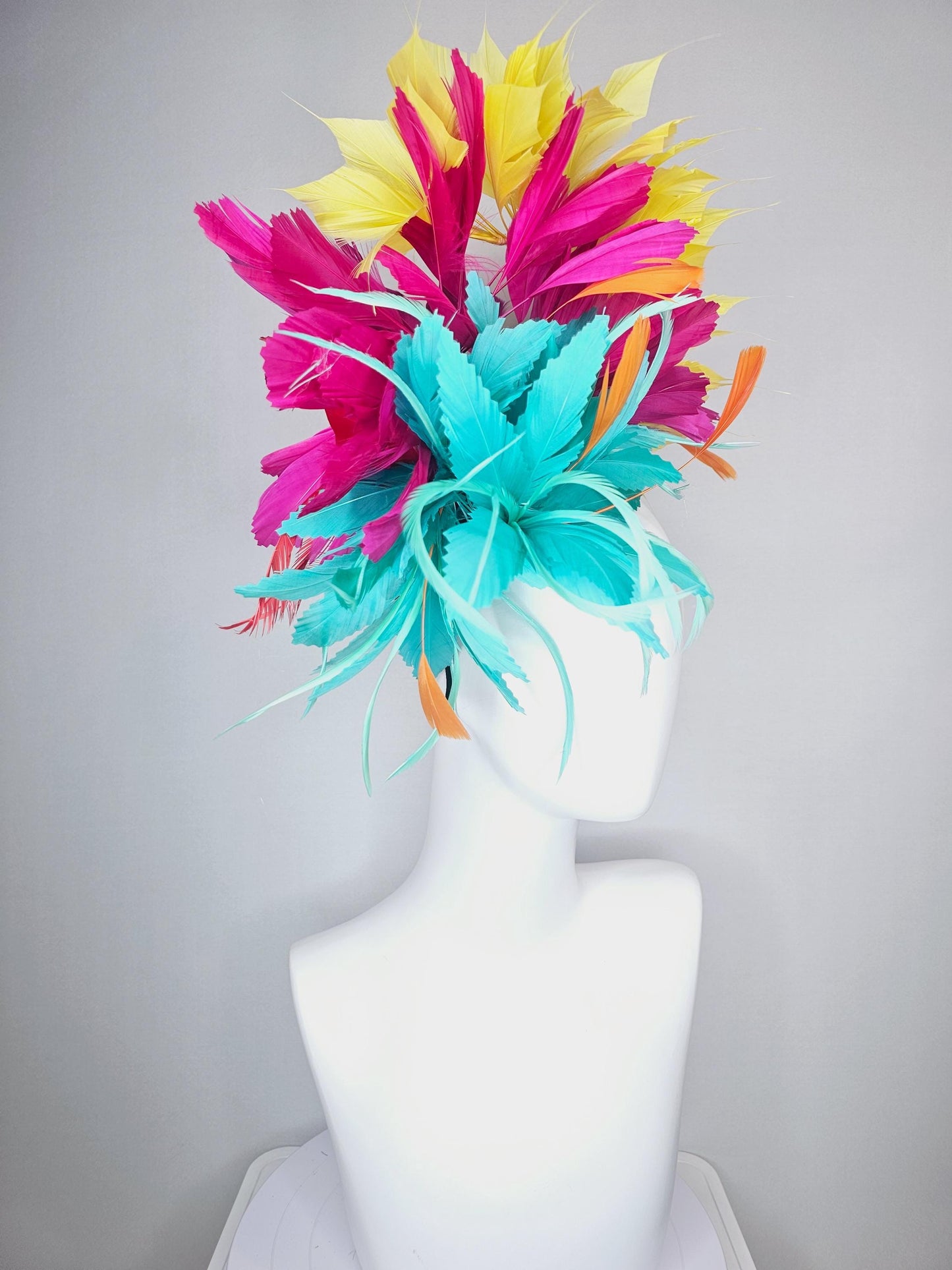 kentucky derby hat fascinator colorful fluffy aqua blue zigzag feather flower and hot pink fuchsia cherry red yellow branching feathers