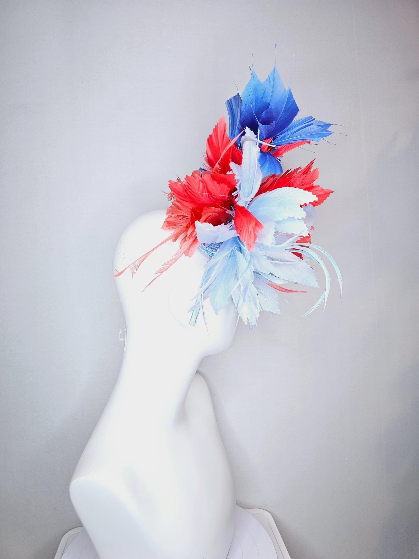 kentucky derby hat fascinator fluffy light blue zigzag feather flower and coral red royal cobalt blue baby blue branching feathers