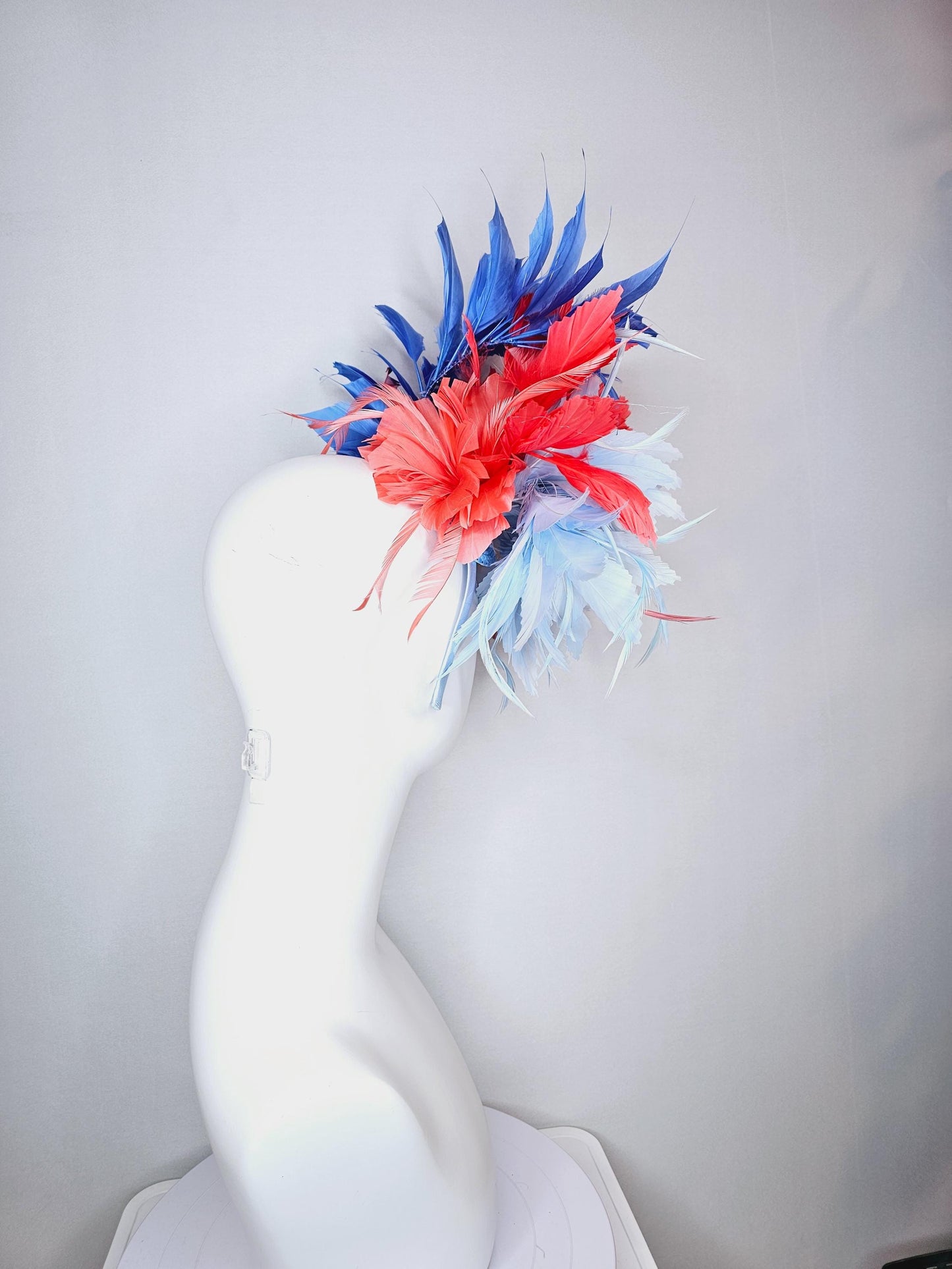 kentucky derby hat fascinator fluffy light blue zigzag feather flower and coral red royal cobalt blue baby blue branching feathers
