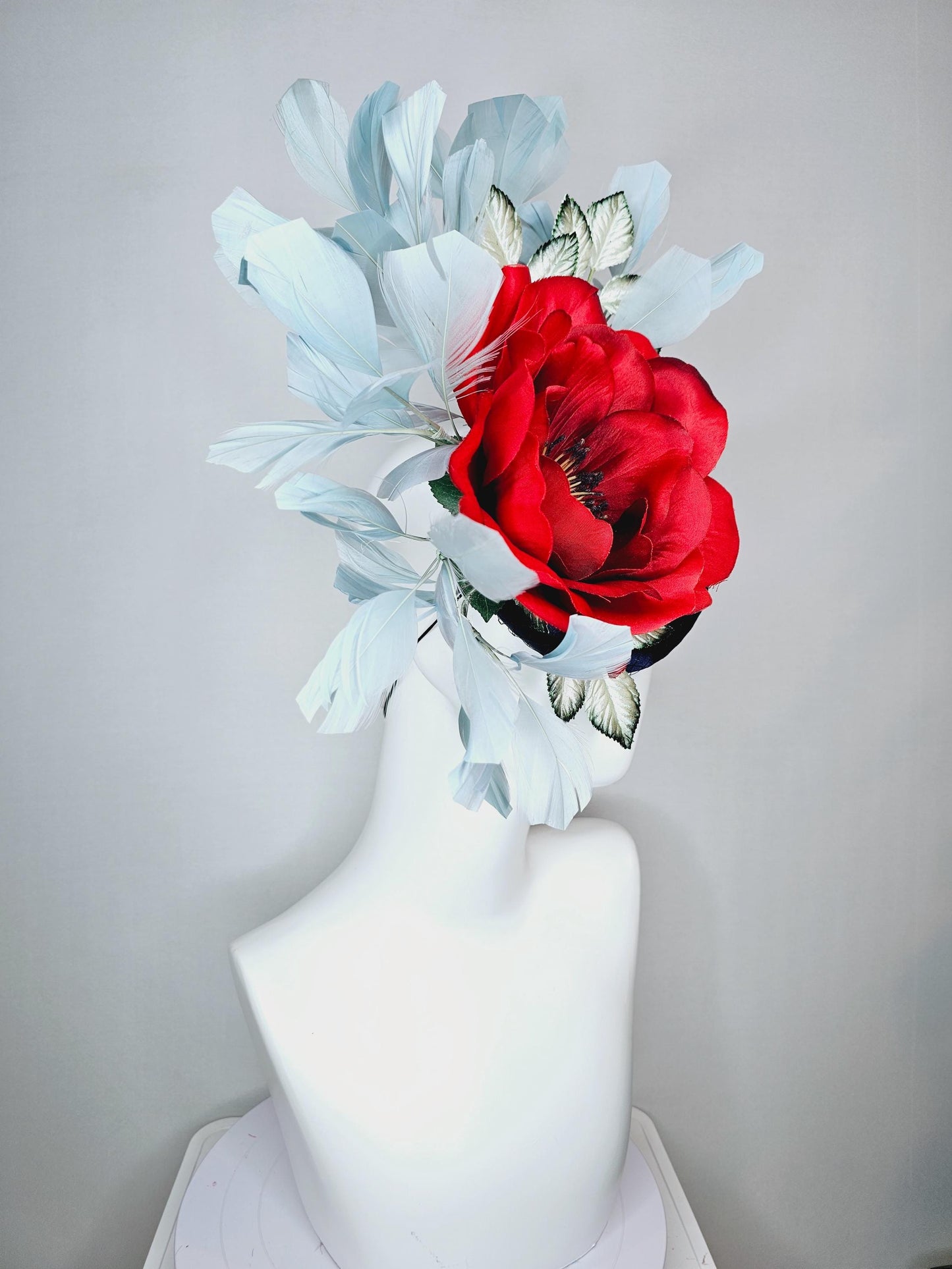 kentucky derby hat fascinator navy blue satin with netting red satin rose flower ombre green leaves with light teal blue branching feathers