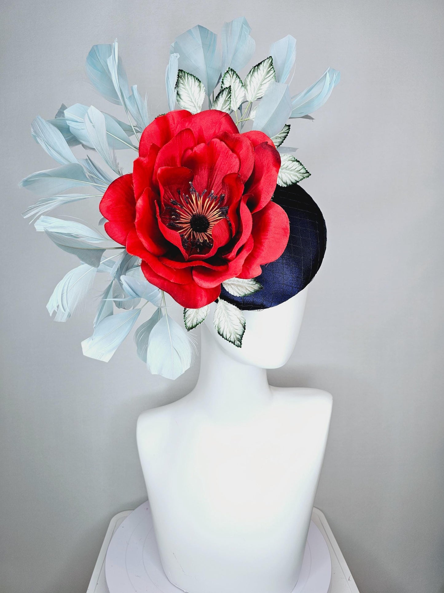 kentucky derby hat fascinator navy blue satin with netting red satin rose flower ombre green leaves with light teal blue branching feathers