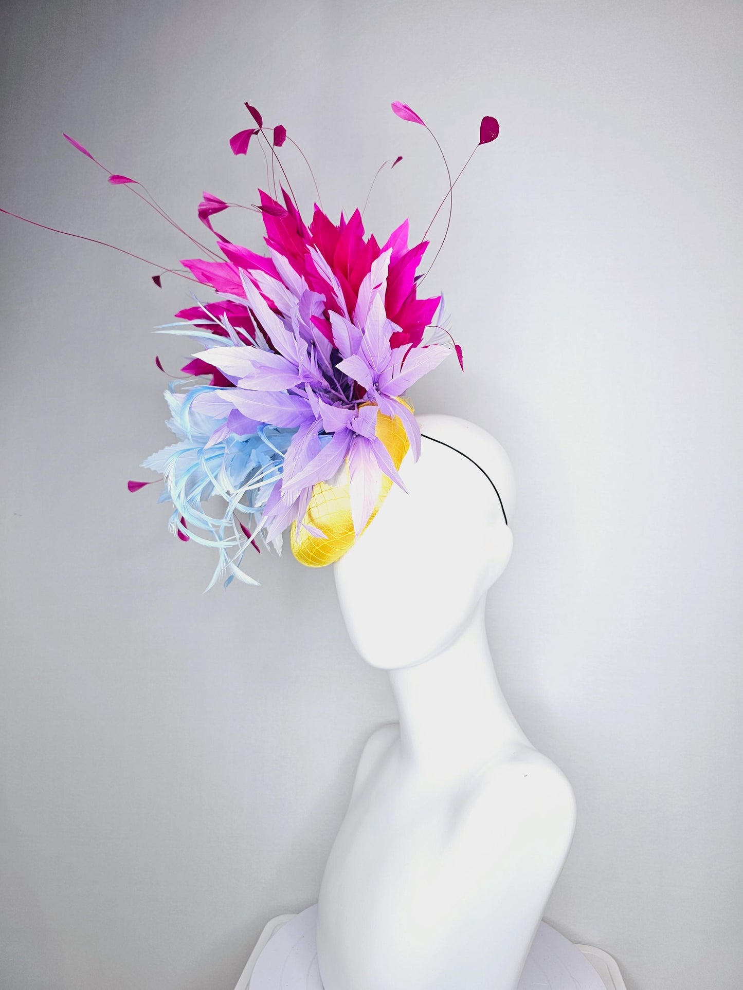 kentucky derby hat fascinator colorful yellow satin with netting baby blue and lavender purple feather flowers bright pink feathers