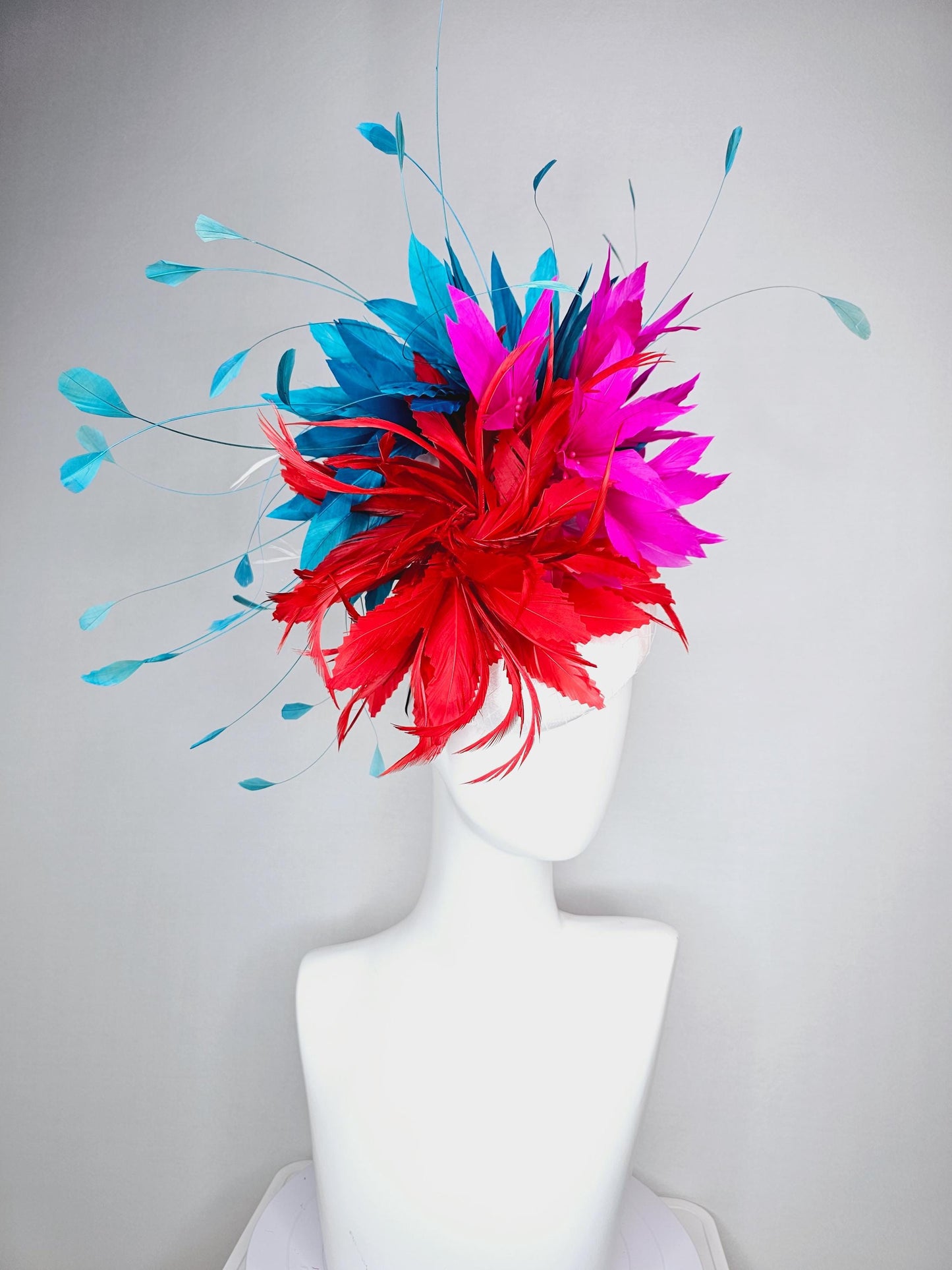 kentucky derby hat fascinator colorful white satin with netting scarlet red and bright fuchsia pink feather flowers and teal blue feathers
