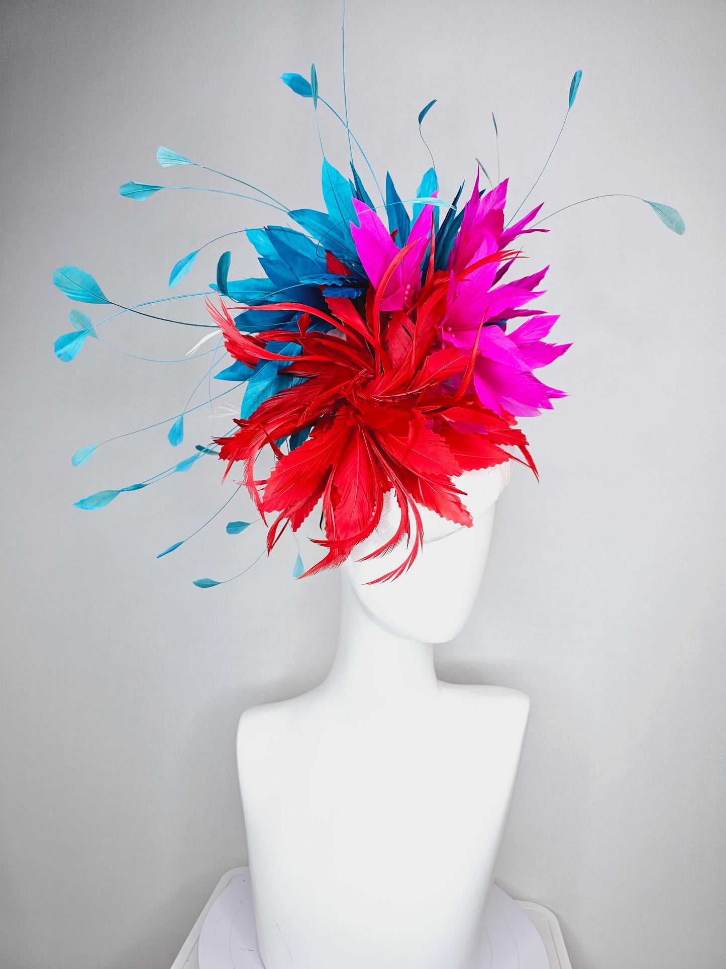 kentucky derby hat fascinator colorful white satin with netting scarlet red and bright fuchsia pink feather flowers and teal blue feathers