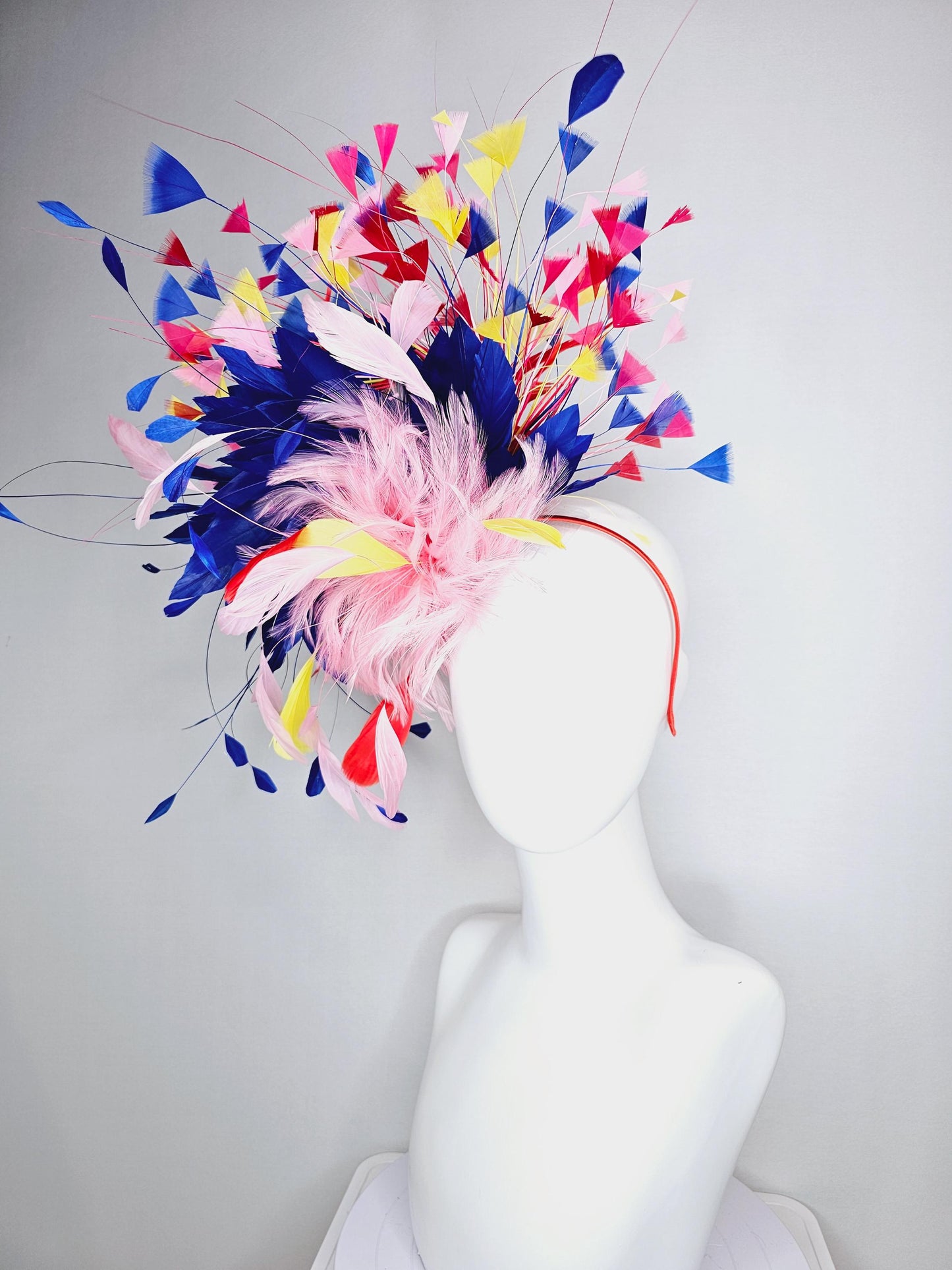 kentucky derby hat fascinator light pink and red feather flowers with colorful light pink yellow royal cobalt blue red branching feathers