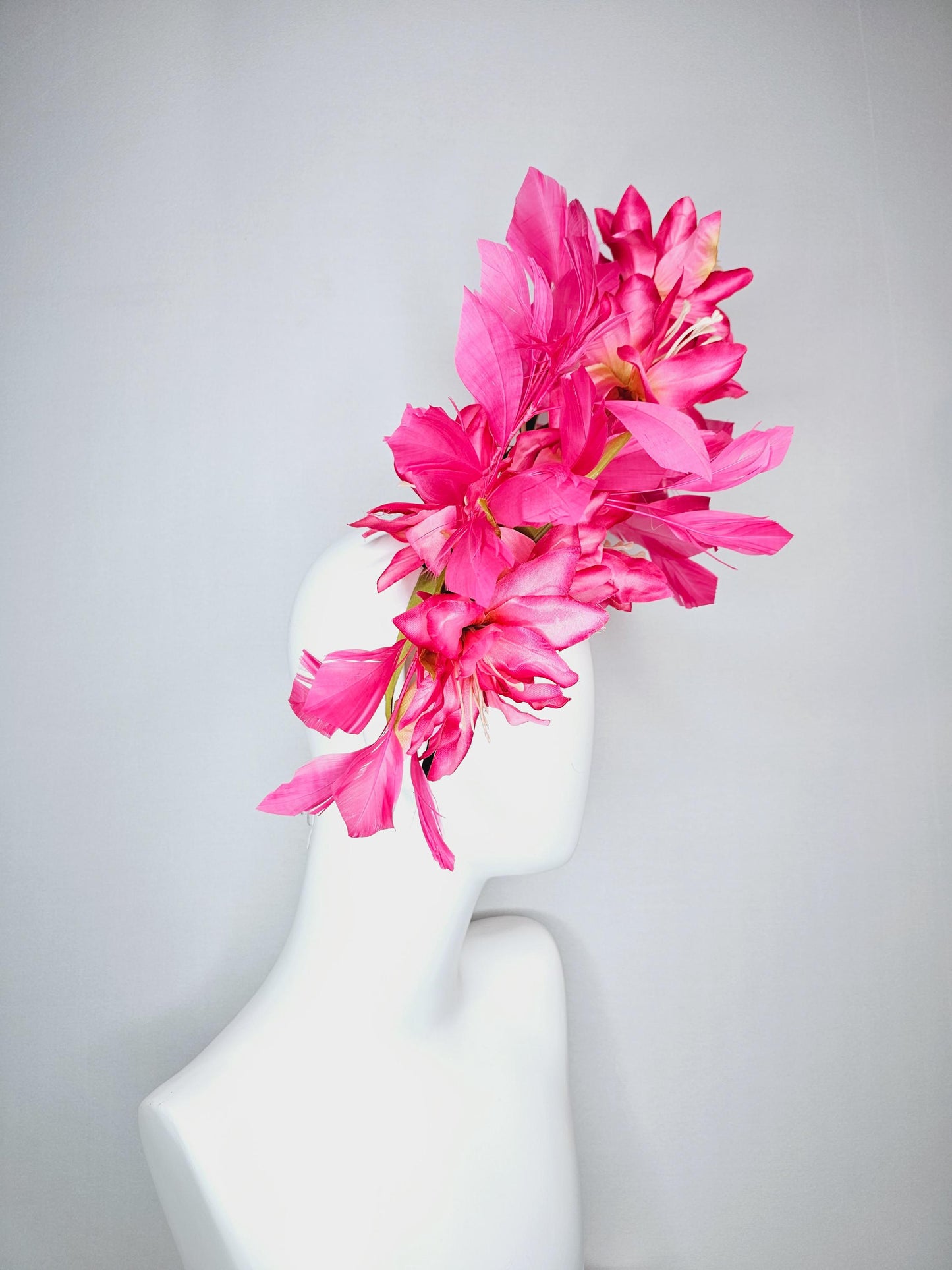 kentucky derby hat fascinator raspberry pink ombre satin silk flowers with green leaves and hot fuchsia pink branching feathers