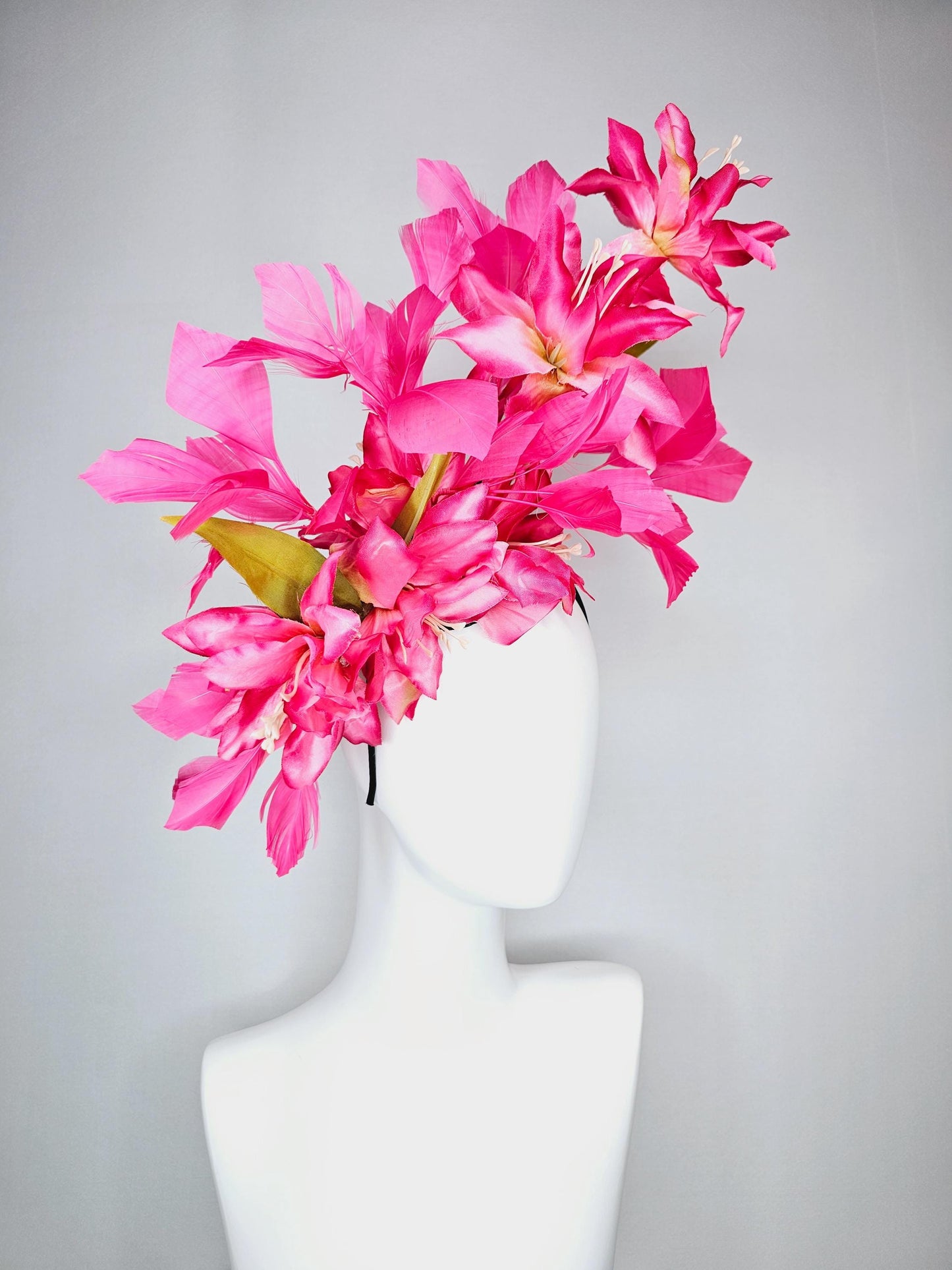 kentucky derby hat fascinator raspberry pink ombre satin silk flowers with green leaves and hot fuchsia pink branching feathers