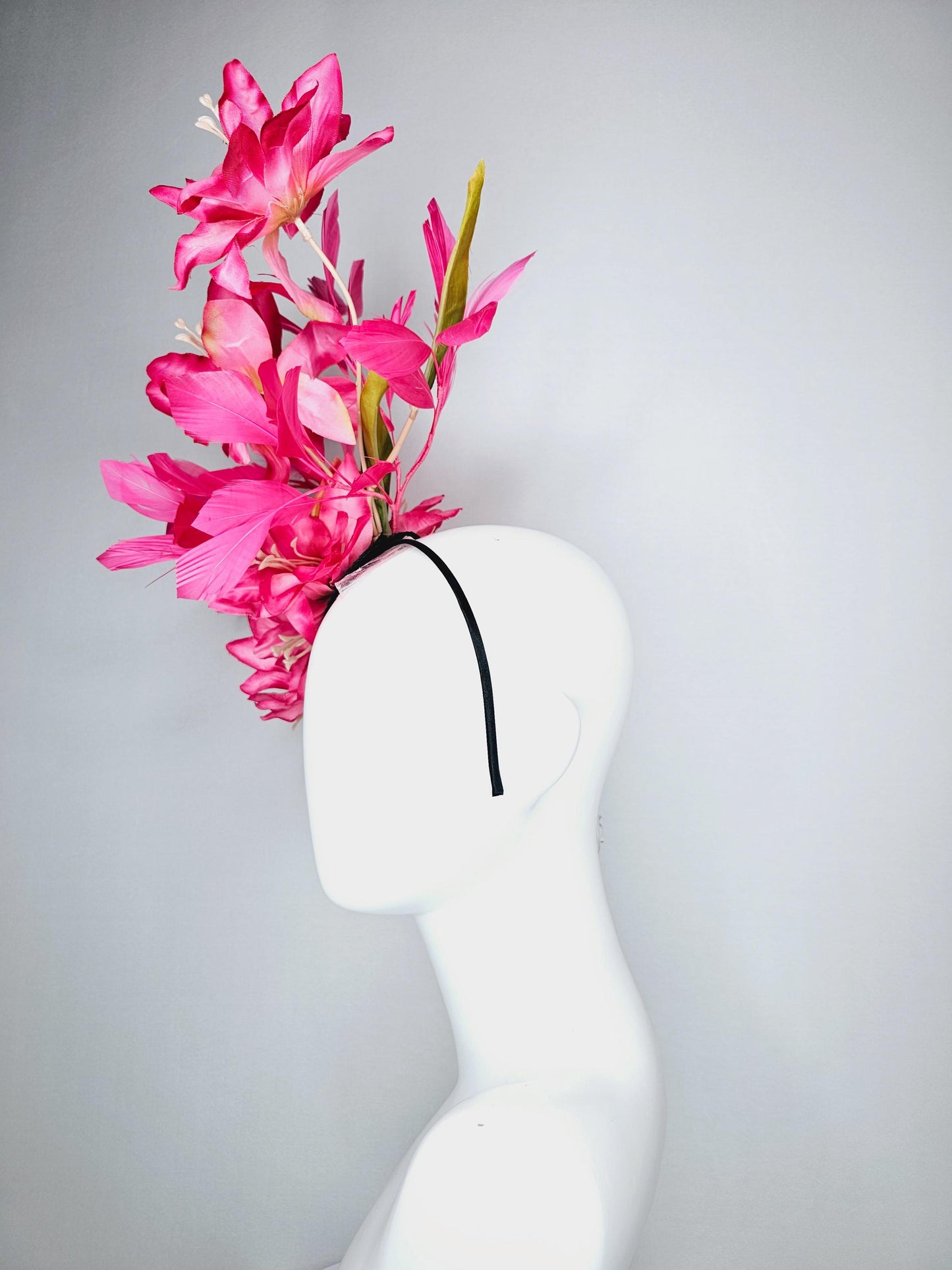 kentucky derby hat fascinator raspberry pink ombre satin silk flowers with green leaves and hot fuchsia pink branching feathers