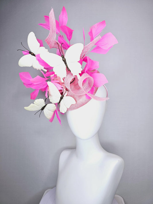 kentucky derby hat fascinator baby pink sinamay with tall curls baby pink satin flower white large butterflies and pink branching feathers
