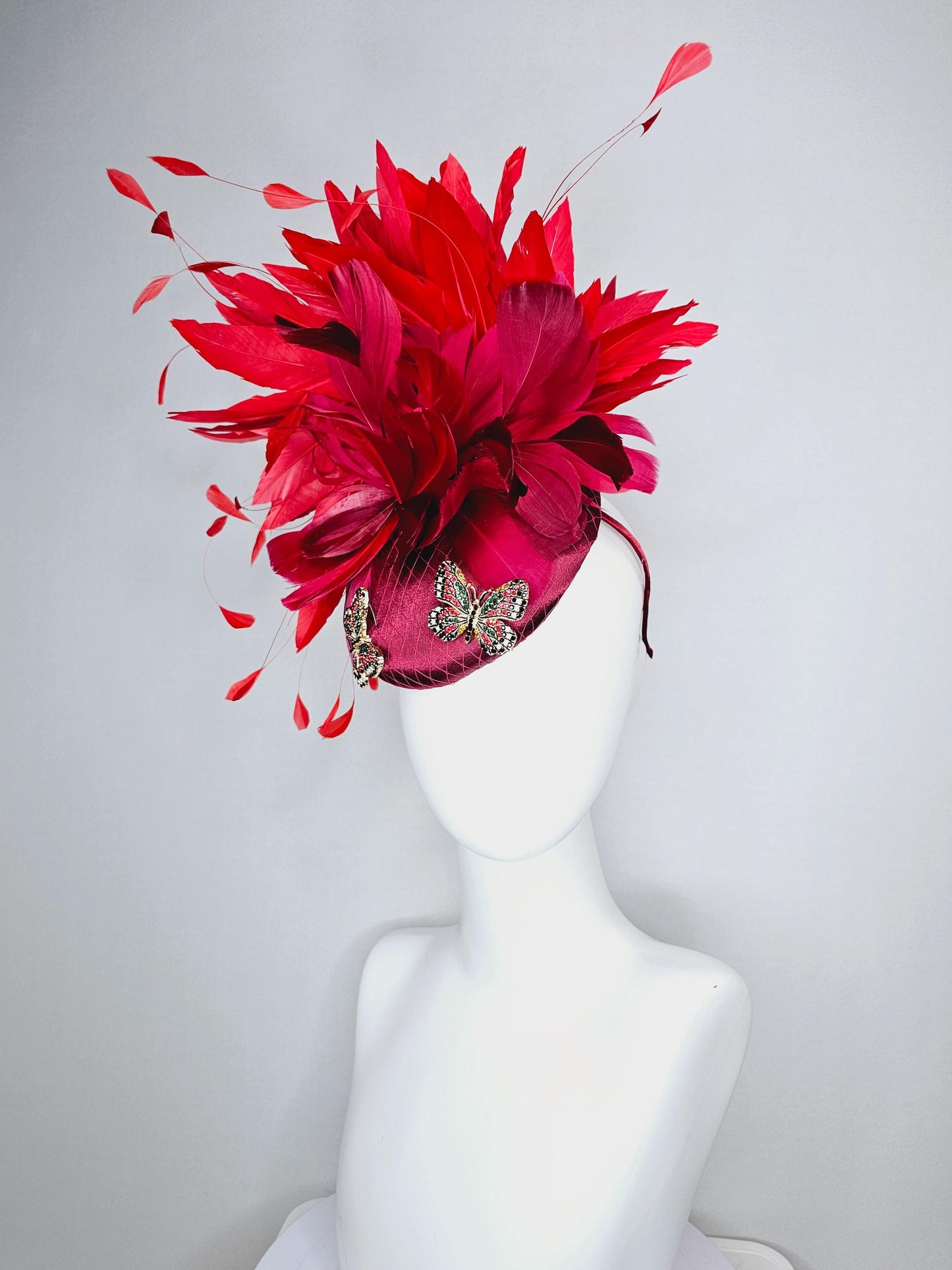 kentucky derby hat fascinator wine red satin with netting and colorful crystal jewels butterflies scarlet red wine red branching feathers