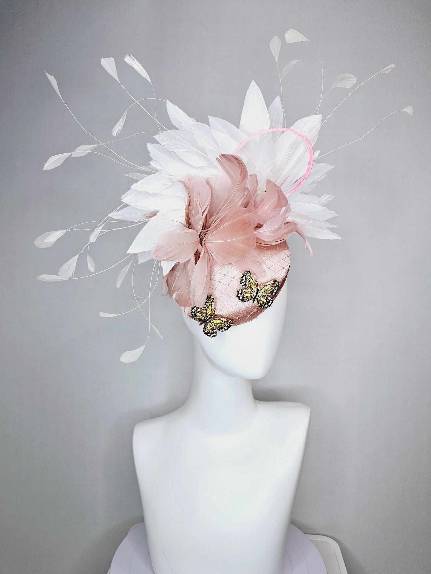 kentucky derby hat fascinator champagne pink satin with netting and colorful crystal jewels butterflies dusty pink white branching feathers