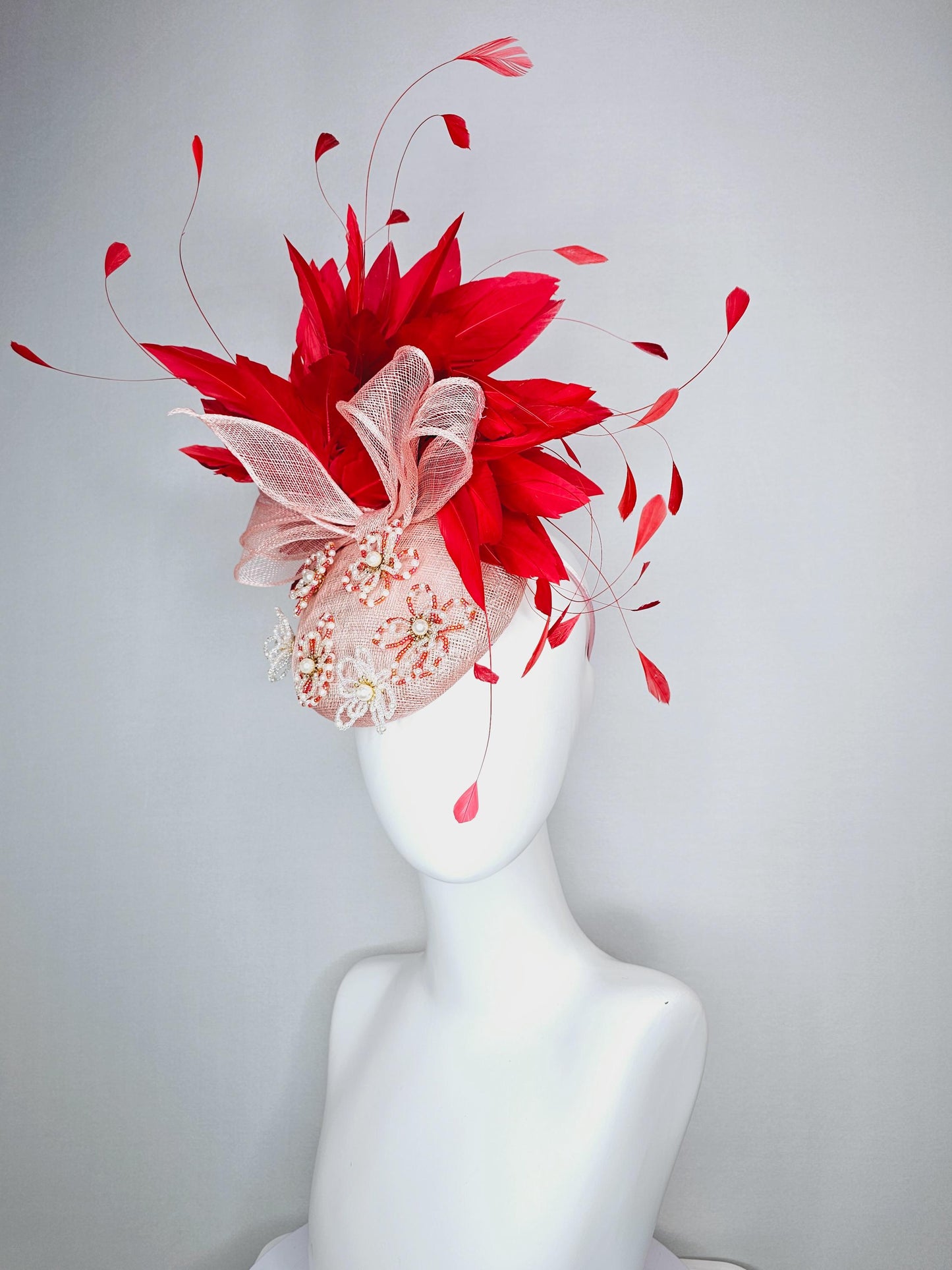 kentucky derby hat fascinator pink champagne sinamay with bow and pearl jewel embroidered flowers with scarlet red branching feathers