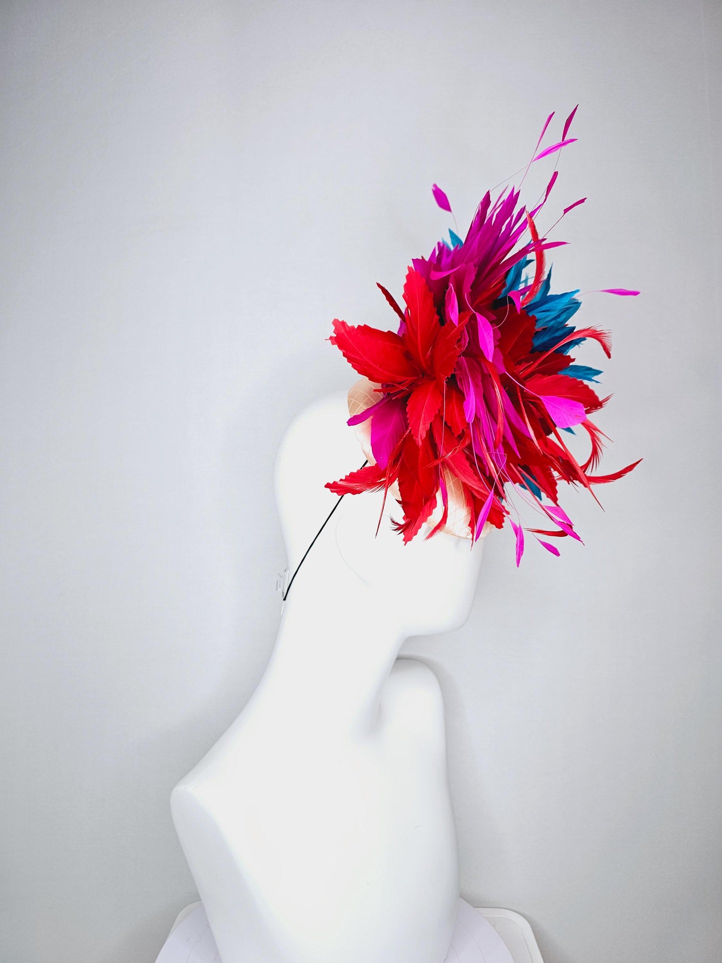 kentucky derby hat fascinator colorful champagne pink satin with netting fluffy scarlet red zigzag feather flower fuchsia pink blue feathers