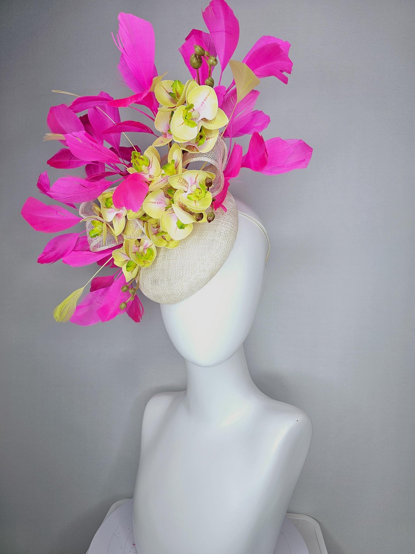 kentucky derby hat fascinator ivory white sinamay with bow and yellow satin silk orchid flowers with bright fuchsia pink branching feathers