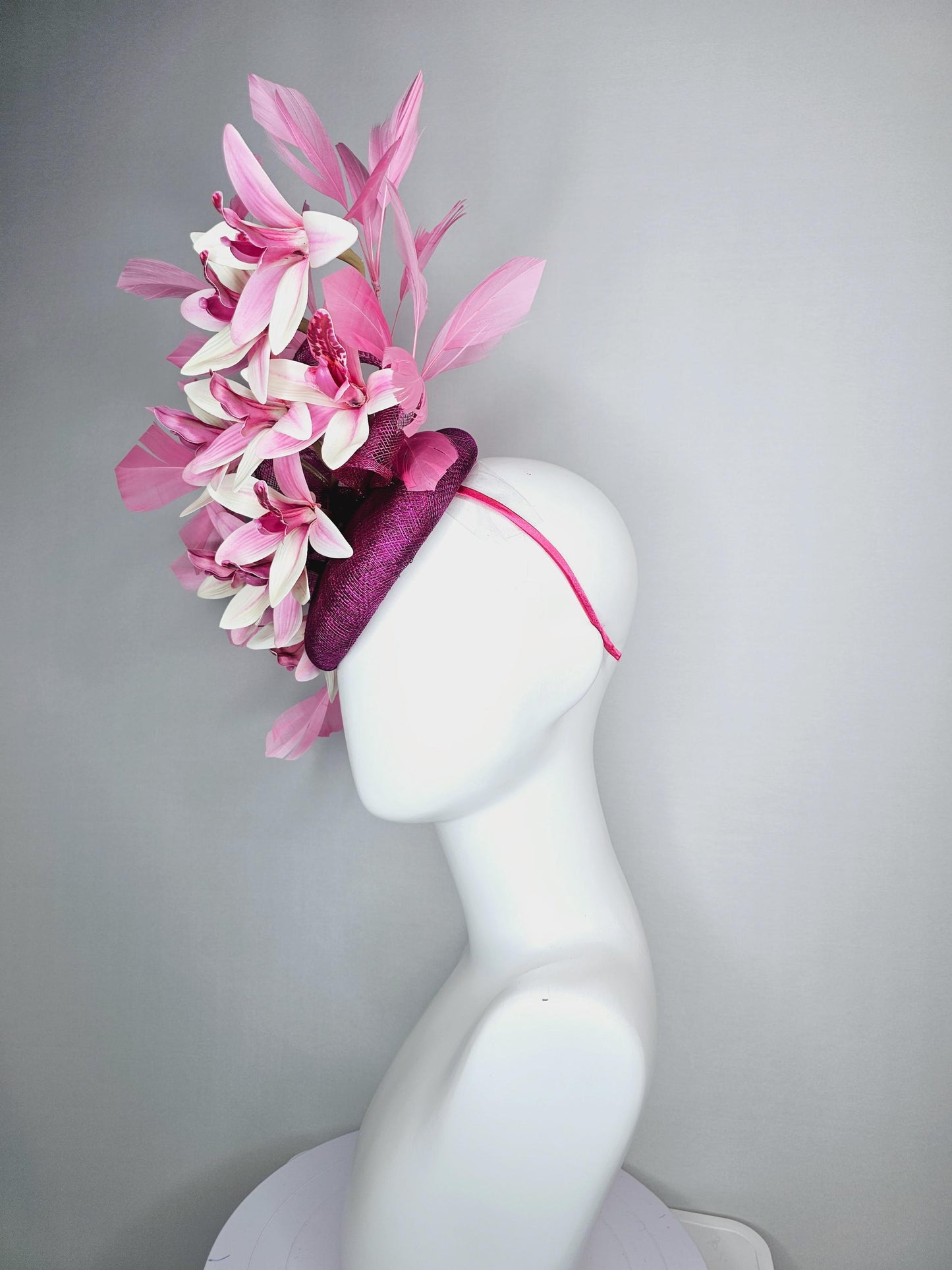 kentucky derby hat fascinator magenta purple sinamay with bow and white and pink satin orchid flowers with blush pink branching feathers