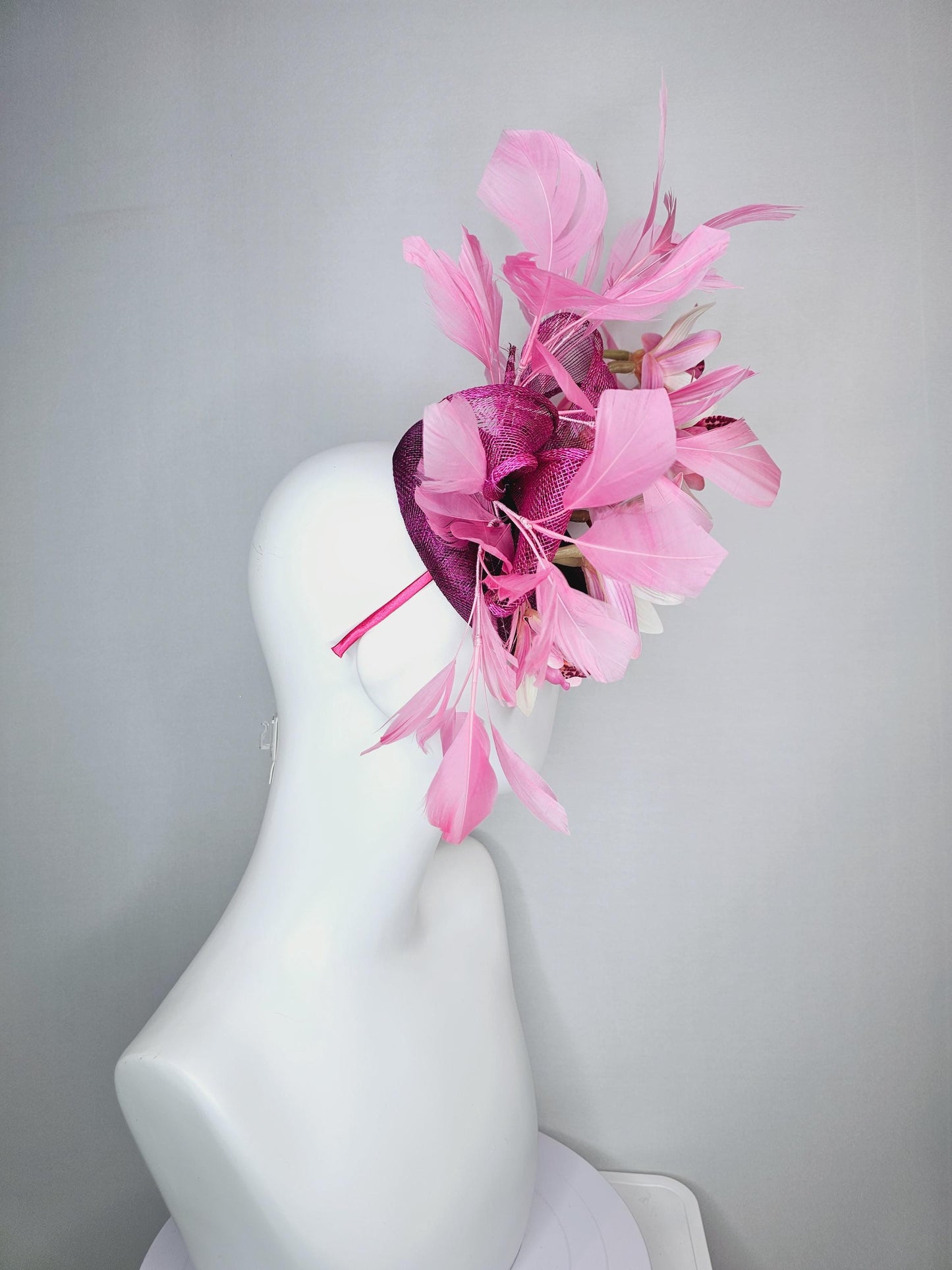 kentucky derby hat fascinator magenta purple sinamay with bow and white and pink satin orchid flowers with blush pink branching feathers