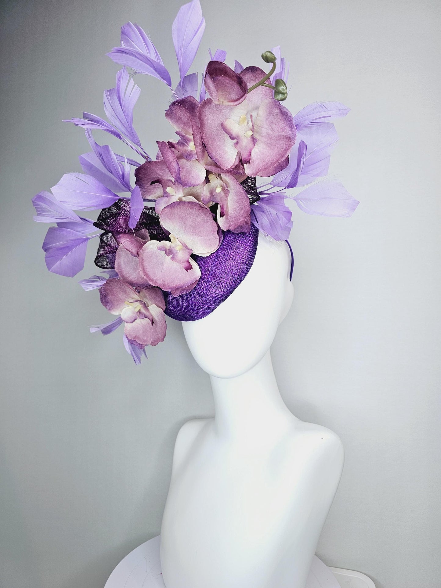 kentucky derby hat fascinator violet purple sinamay with bow and lilac purple satin orchid flowers with lavender purple branching feathers
