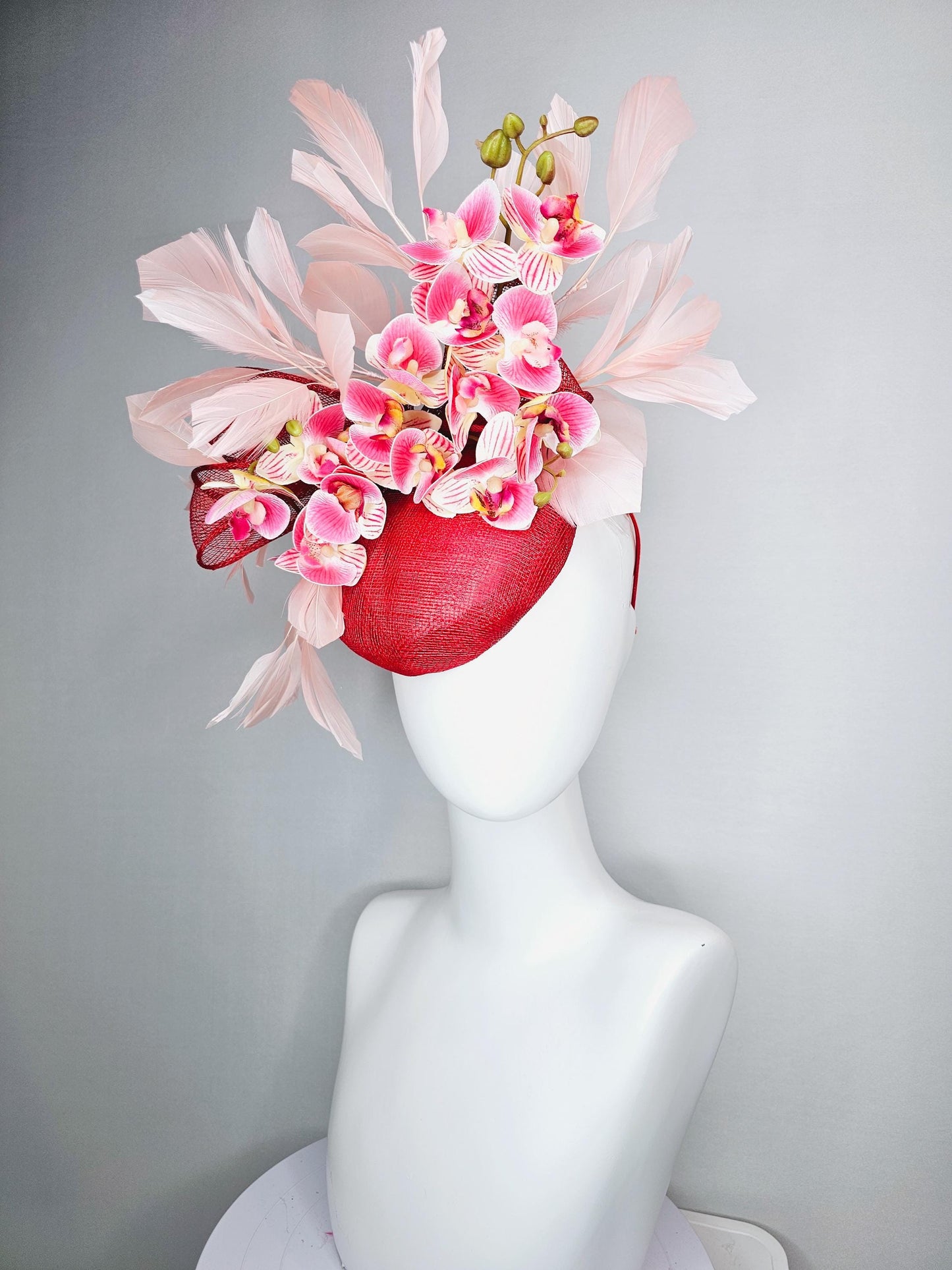kentucky derby hat fascinator red sinamay with bow and white raspberry red pink satin orchid flowers with champagne pink branching feathers