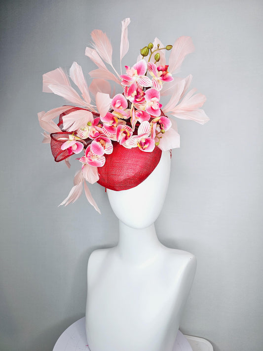 kentucky derby hat fascinator red sinamay with bow and white raspberry red pink satin orchid flowers with champagne pink branching feathers