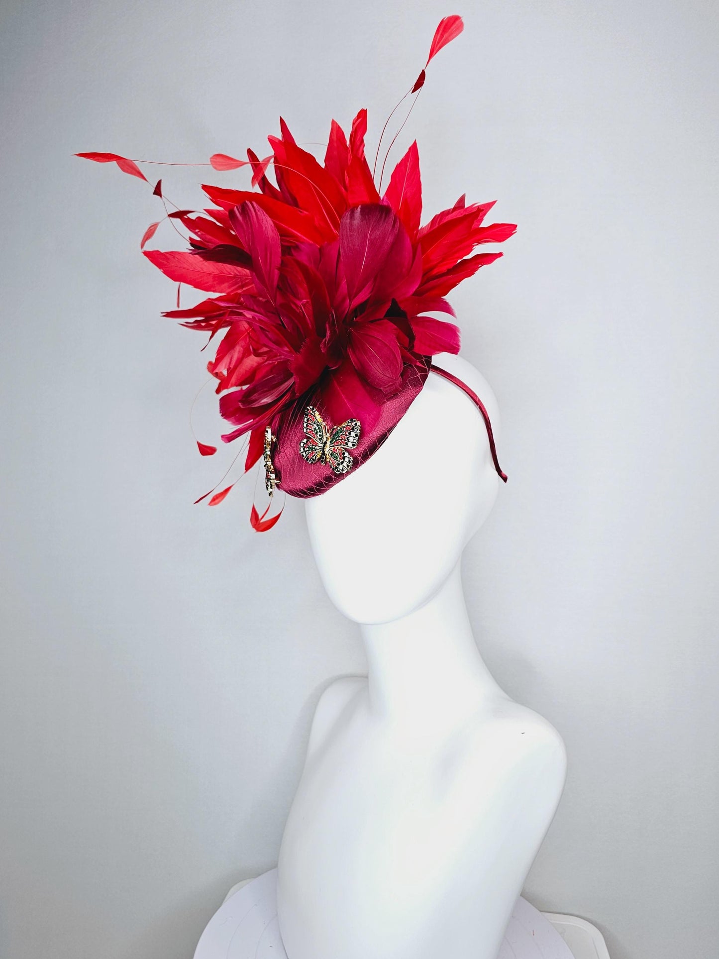kentucky derby hat fascinator wine red satin with netting and colorful crystal jewels butterflies scarlet red wine red branching feathers