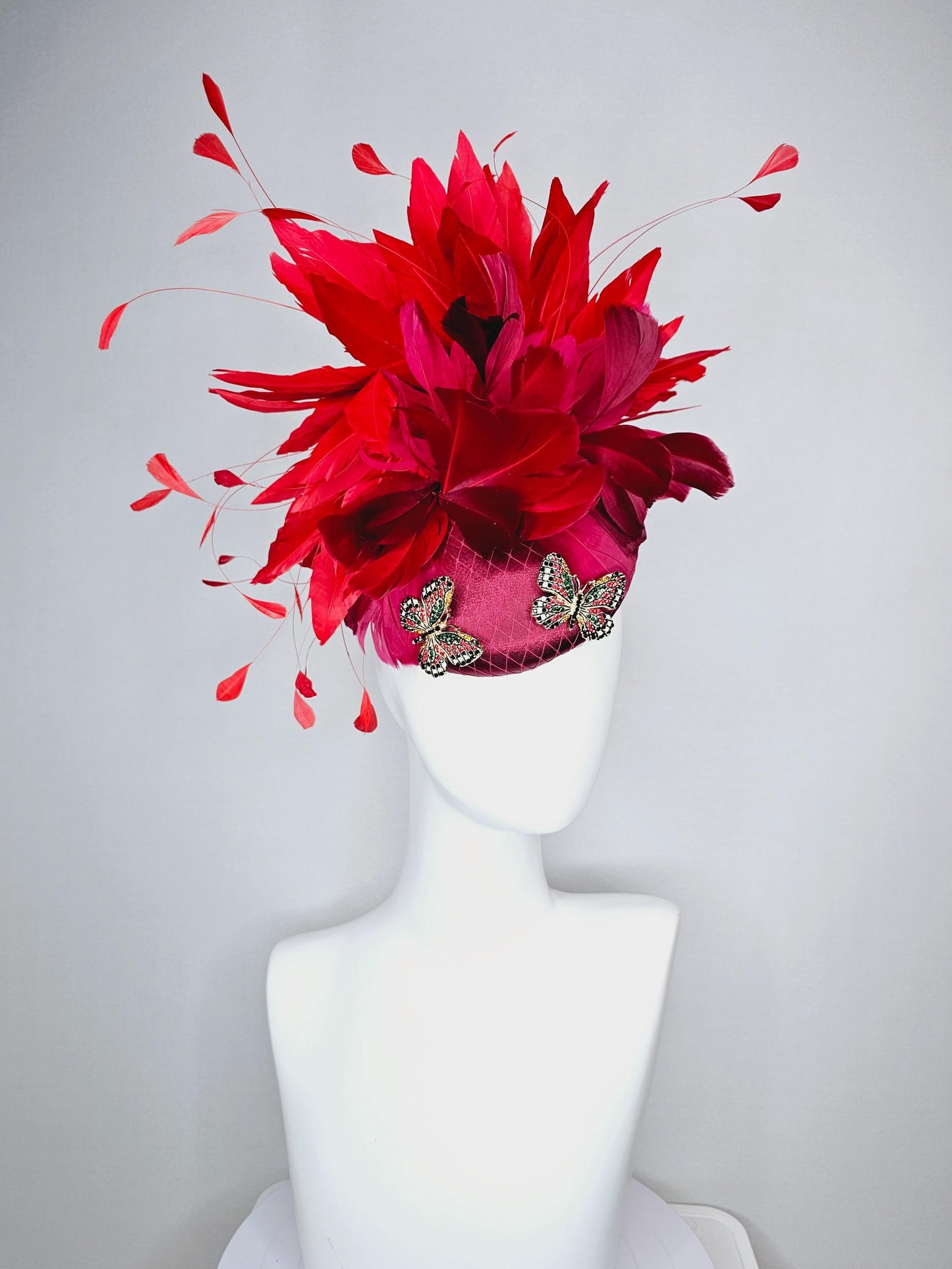 kentucky derby hat fascinator wine red satin with netting and colorful crystal jewels butterflies scarlet red wine red branching feathers