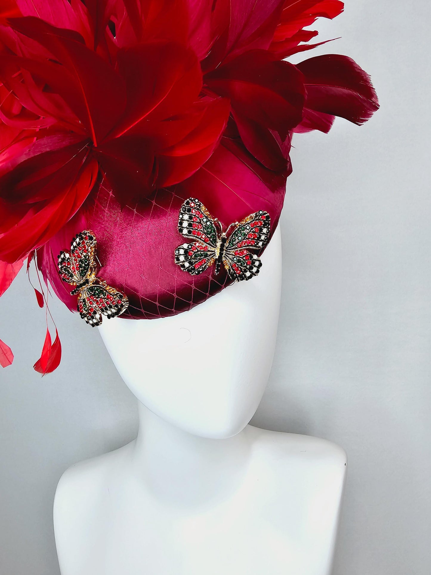 kentucky derby hat fascinator wine red satin with netting and colorful crystal jewels butterflies scarlet red wine red branching feathers