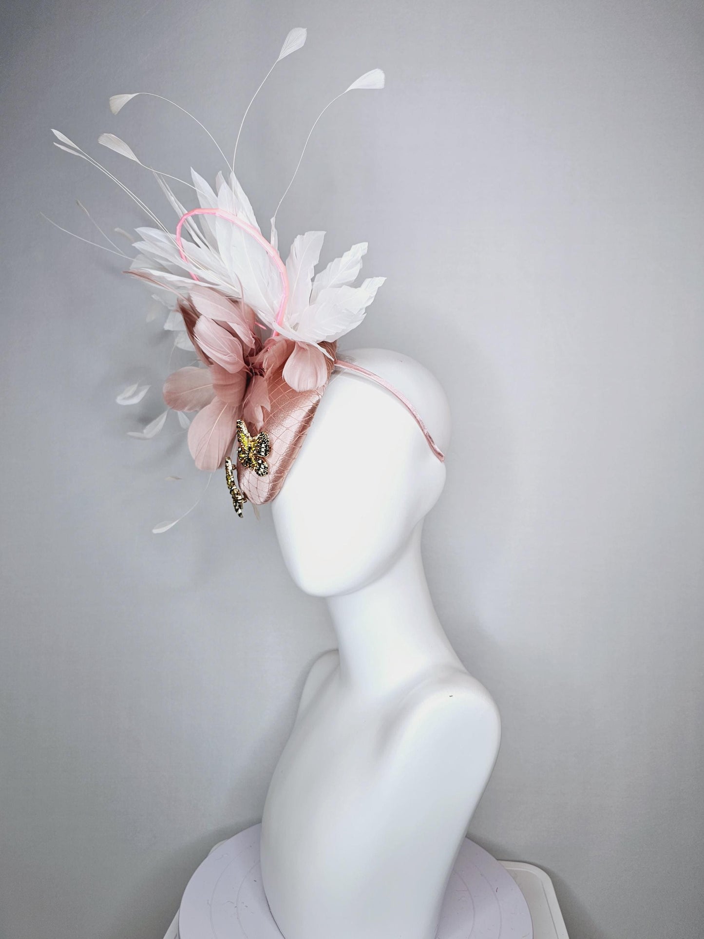 kentucky derby hat fascinator champagne pink satin with netting and colorful crystal jewels butterflies dusty pink white branching feathers