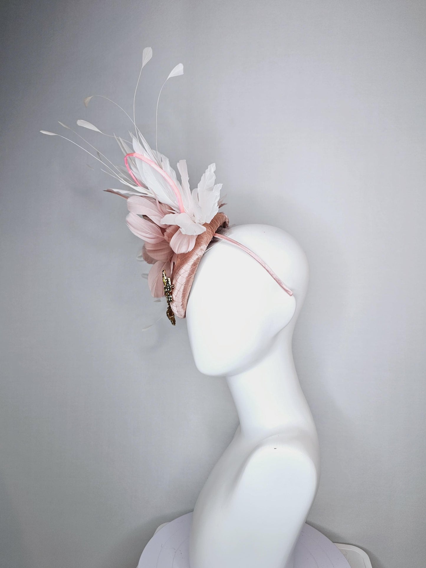 kentucky derby hat fascinator champagne pink satin with netting and colorful crystal jewels butterflies dusty pink white branching feathers