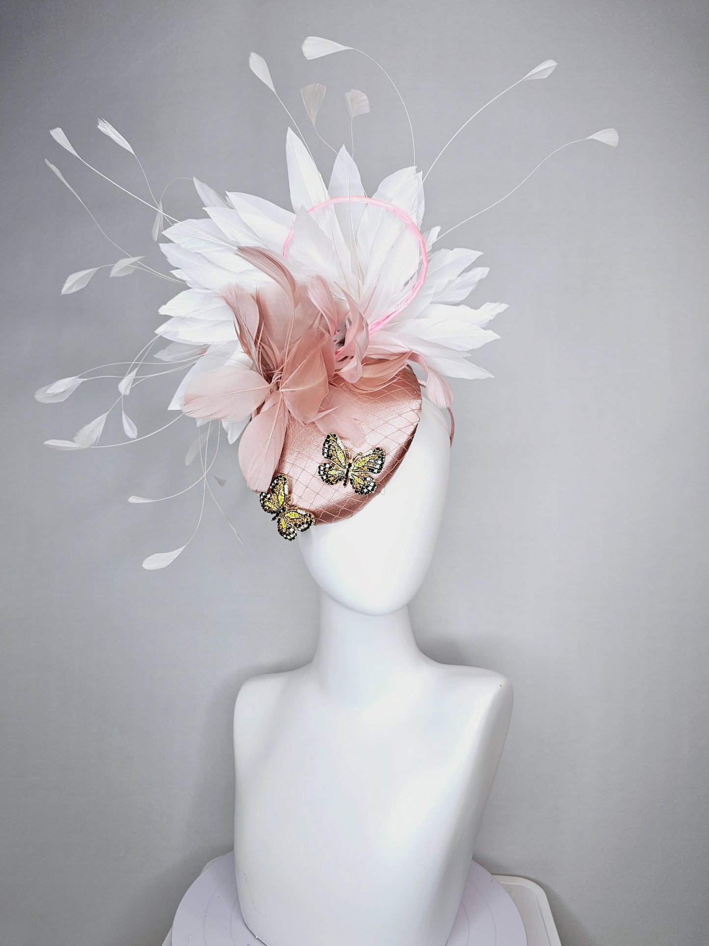 kentucky derby hat fascinator champagne pink satin with netting and colorful crystal jewels butterflies dusty pink white branching feathers
