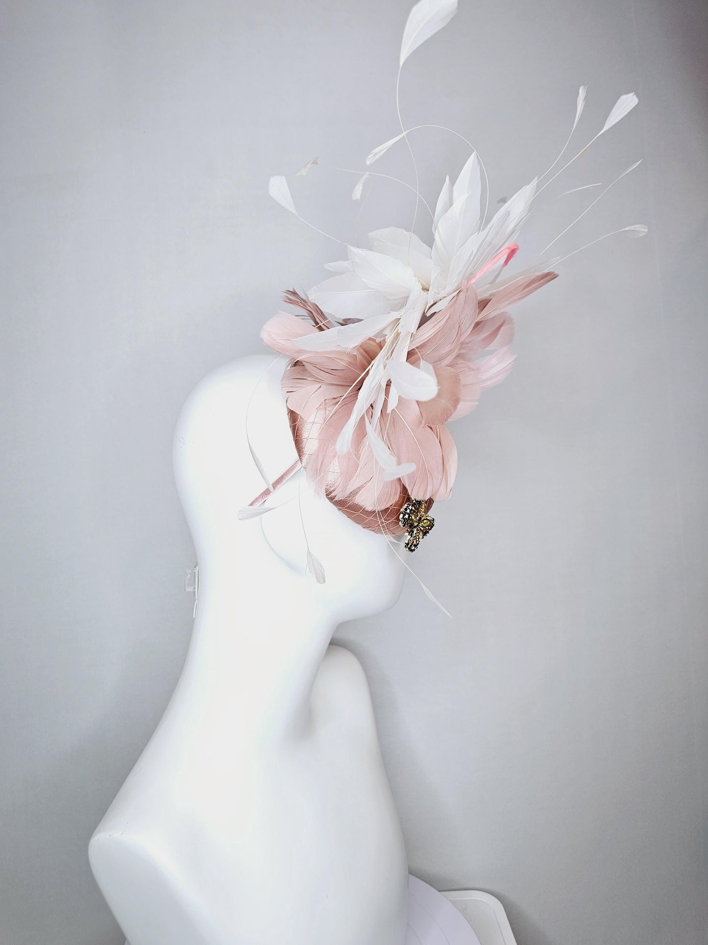 kentucky derby hat fascinator champagne pink satin with netting and colorful crystal jewels butterflies dusty pink white branching feathers