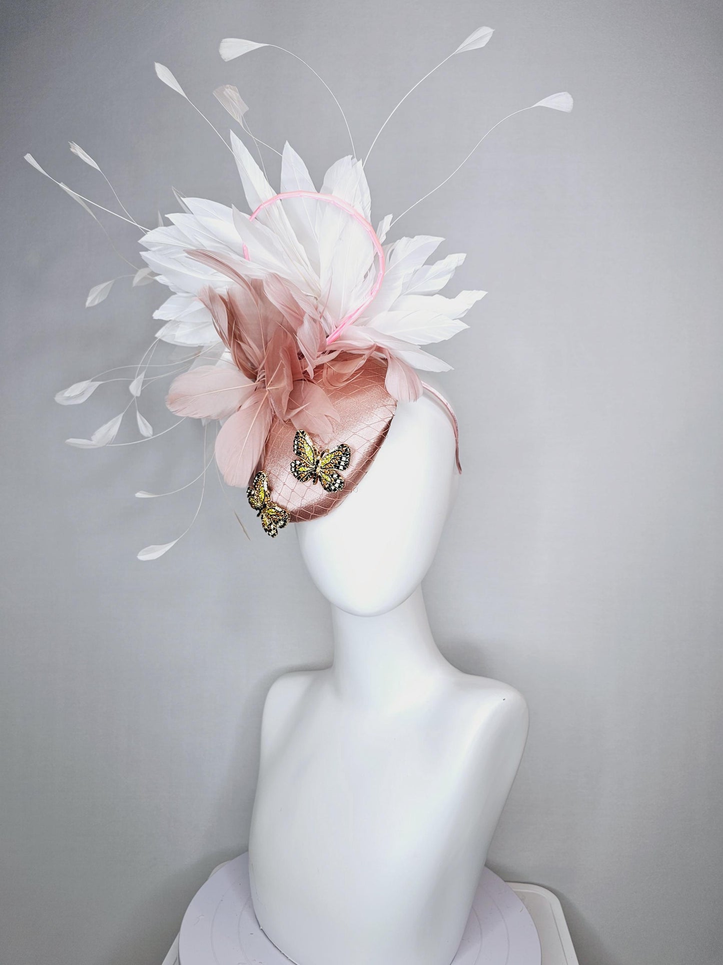 kentucky derby hat fascinator champagne pink satin with netting and colorful crystal jewels butterflies dusty pink white branching feathers