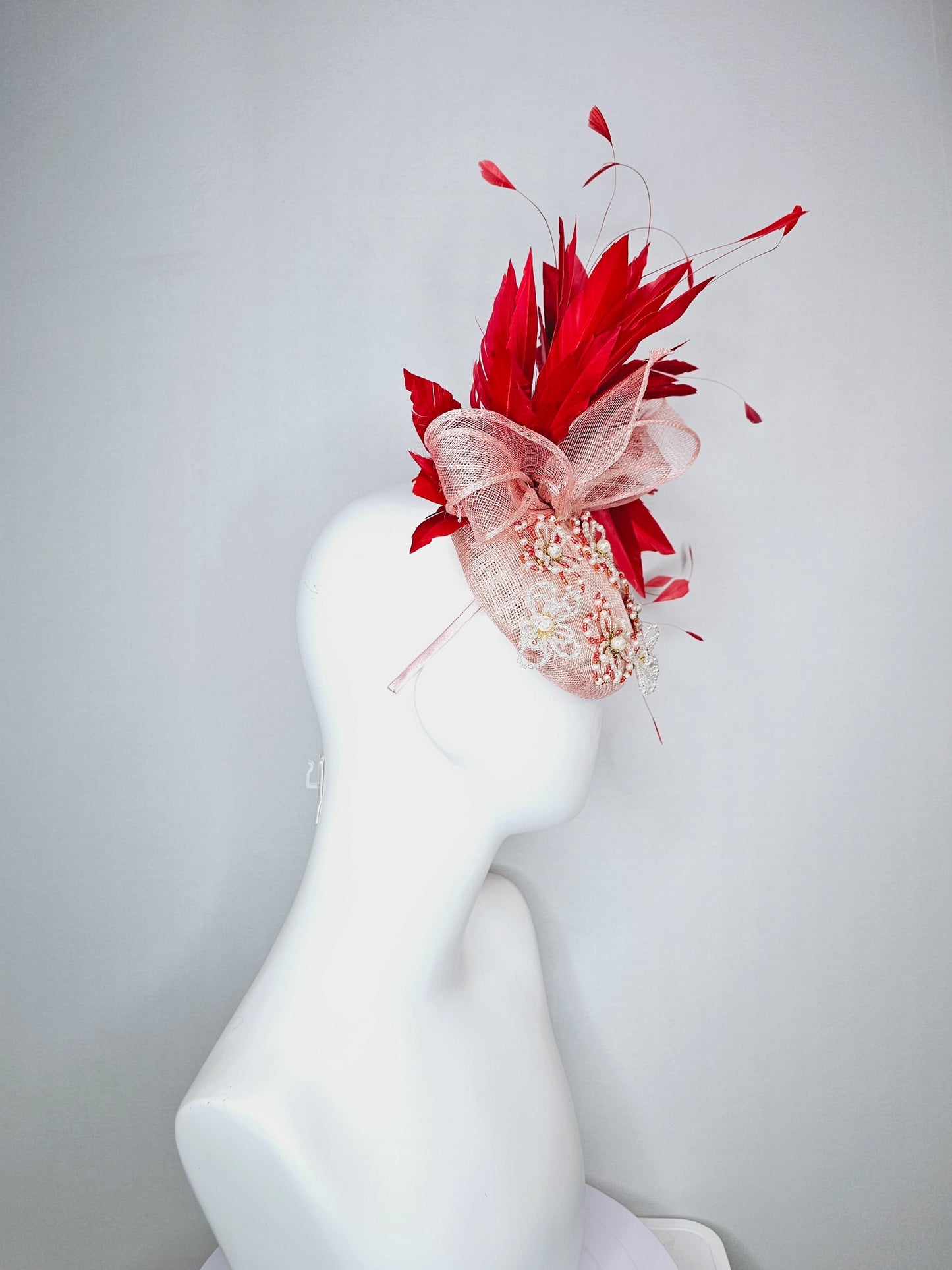 kentucky derby hat fascinator pink champagne sinamay with bow and pearl jewel embroidered flowers with scarlet red branching feathers