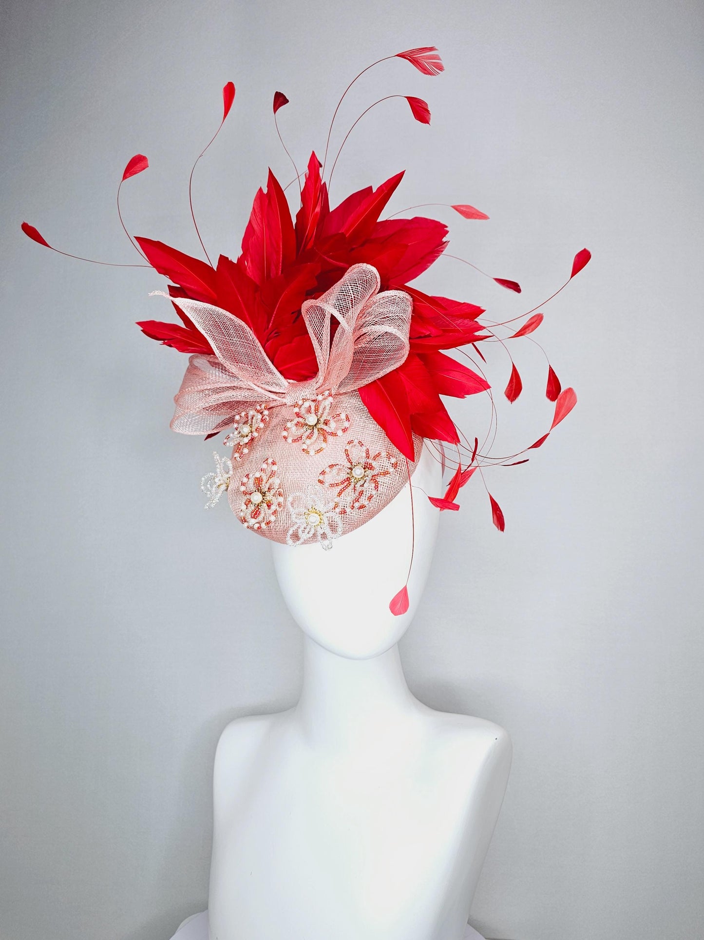 kentucky derby hat fascinator pink champagne sinamay with bow and pearl jewel embroidered flowers with scarlet red branching feathers