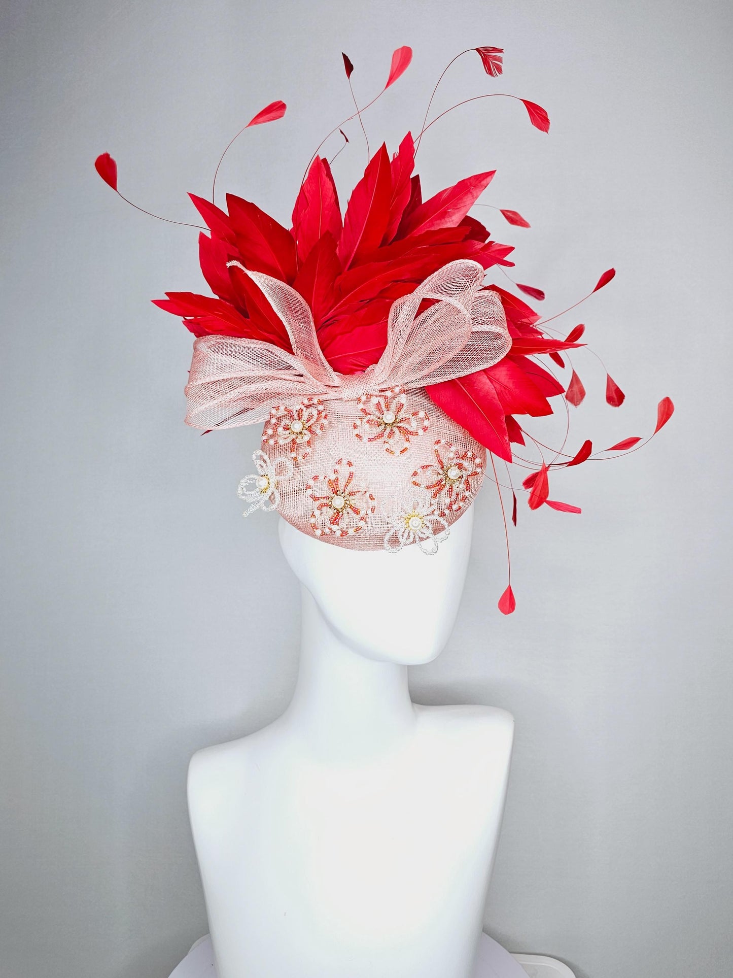 kentucky derby hat fascinator pink champagne sinamay with bow and pearl jewel embroidered flowers with scarlet red branching feathers