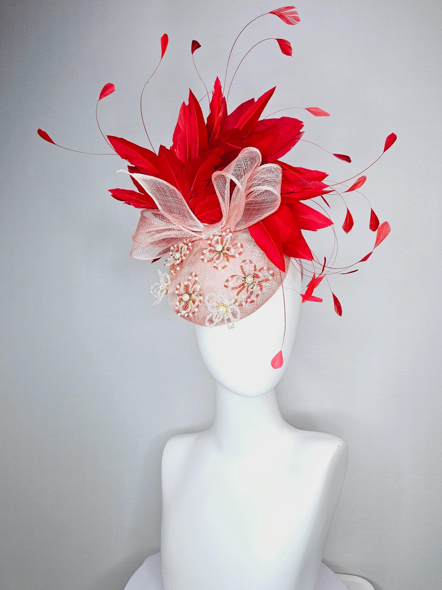 kentucky derby hat fascinator pink champagne sinamay with bow and pearl jewel embroidered flowers with scarlet red branching feathers