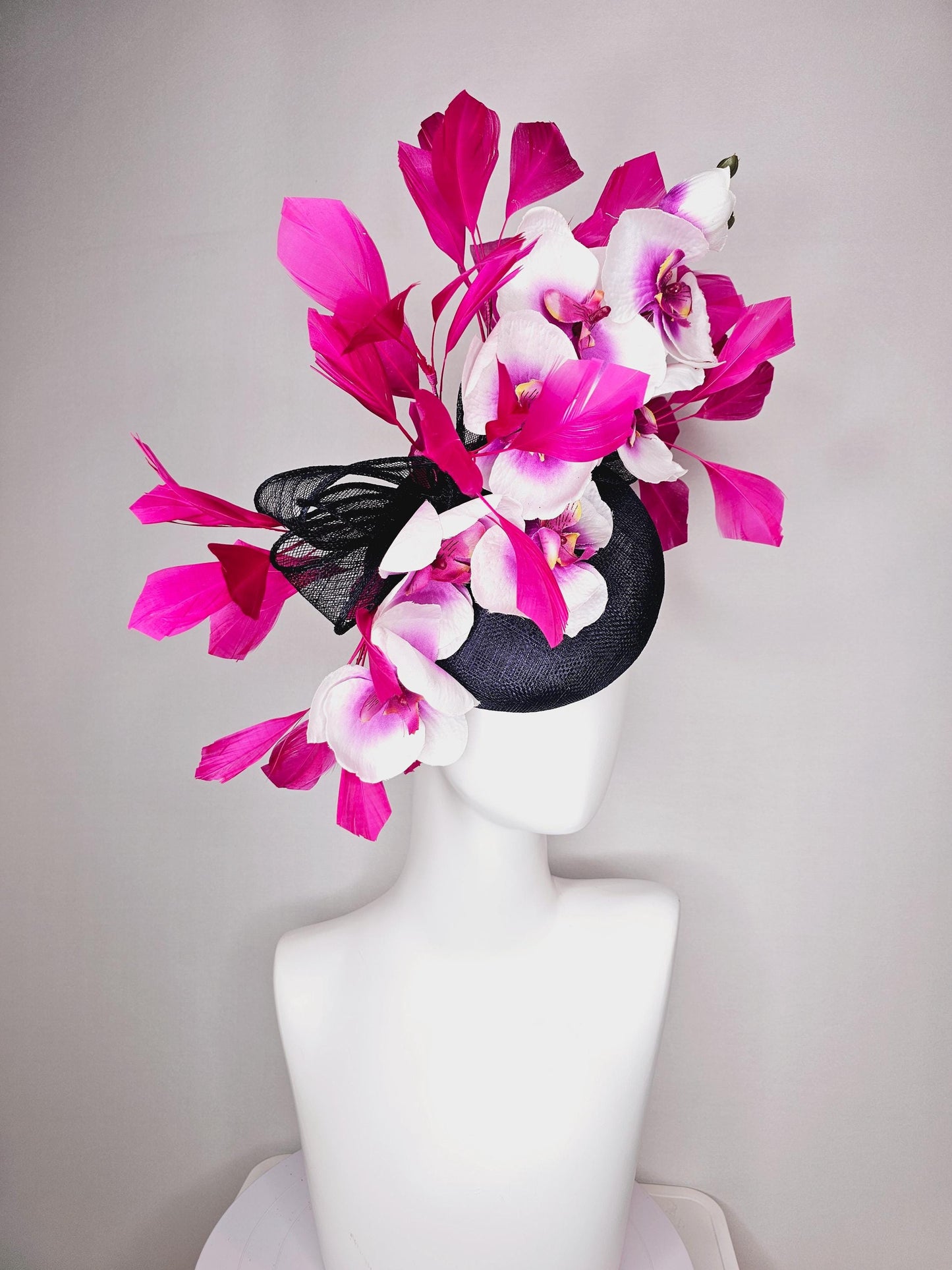 kentucky derby hat fascinator navy blue sinamay with bow and white and pink satin orchid flowers with hot pink branching feathers