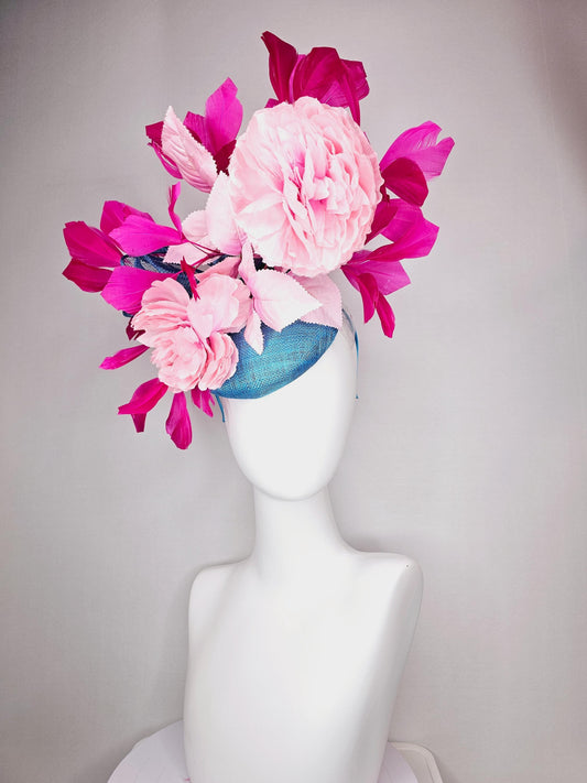 kentucky derby hat fascinator blue sinamay with bow and light pink peony satin flowers light pink leaves hot bright pink branching feathers