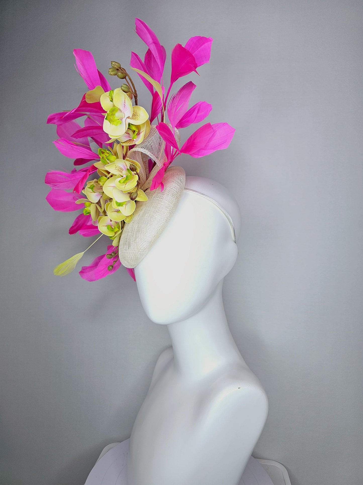 kentucky derby hat fascinator ivory white sinamay with bow and yellow satin silk orchid flowers with bright fuchsia pink branching feathers