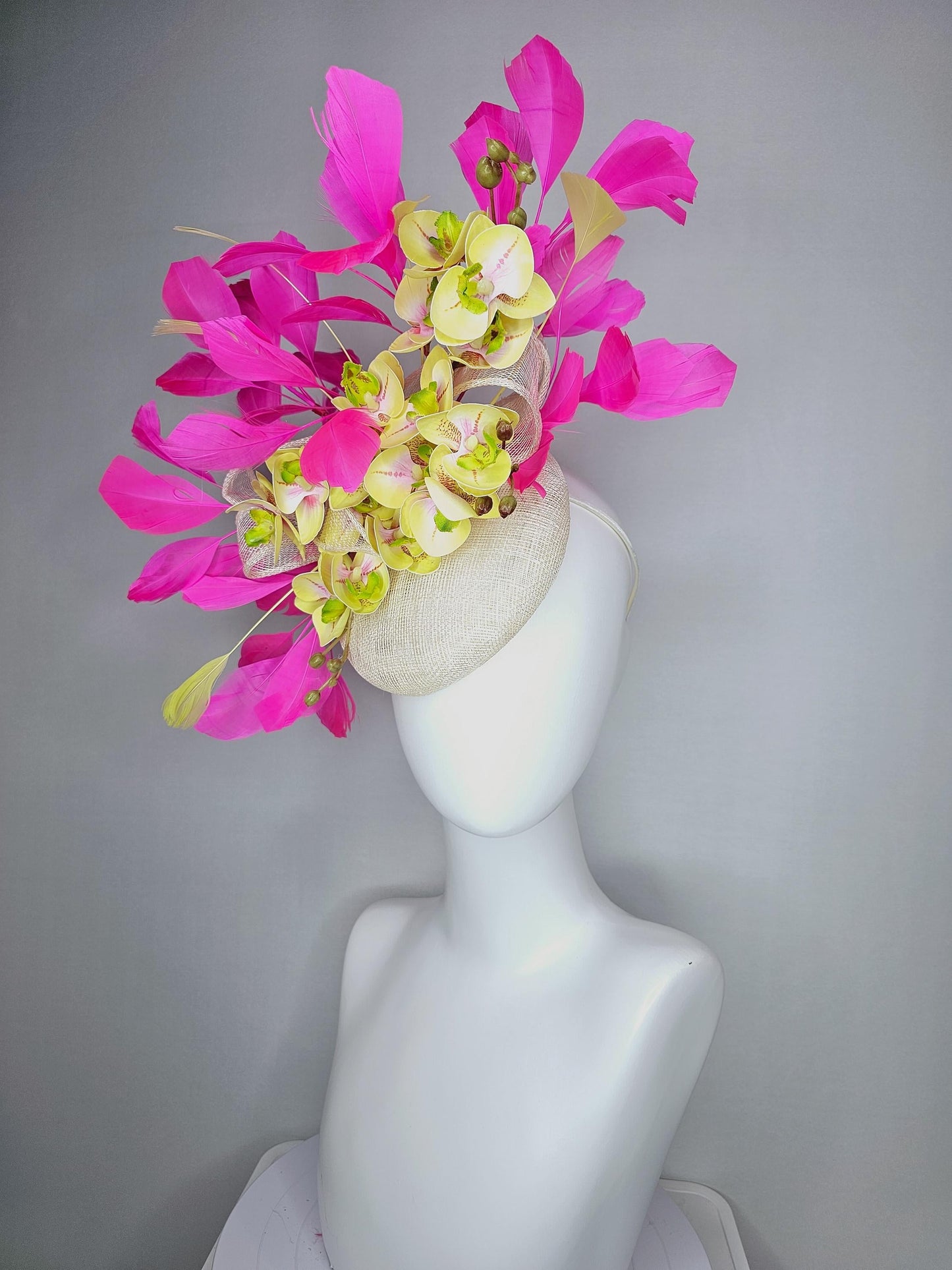 kentucky derby hat fascinator ivory white sinamay with bow and yellow satin silk orchid flowers with bright fuchsia pink branching feathers