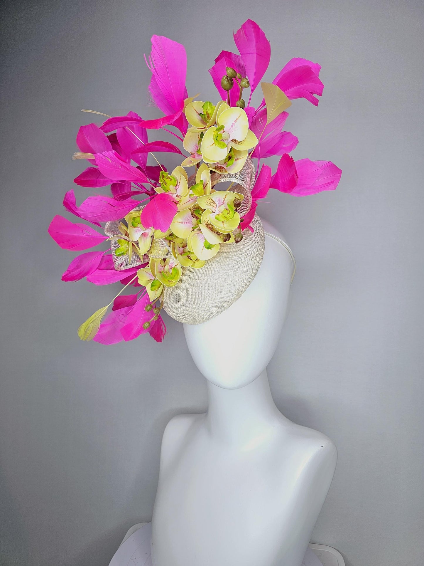 kentucky derby hat fascinator ivory white sinamay with bow and yellow satin silk orchid flowers with bright fuchsia pink branching feathers