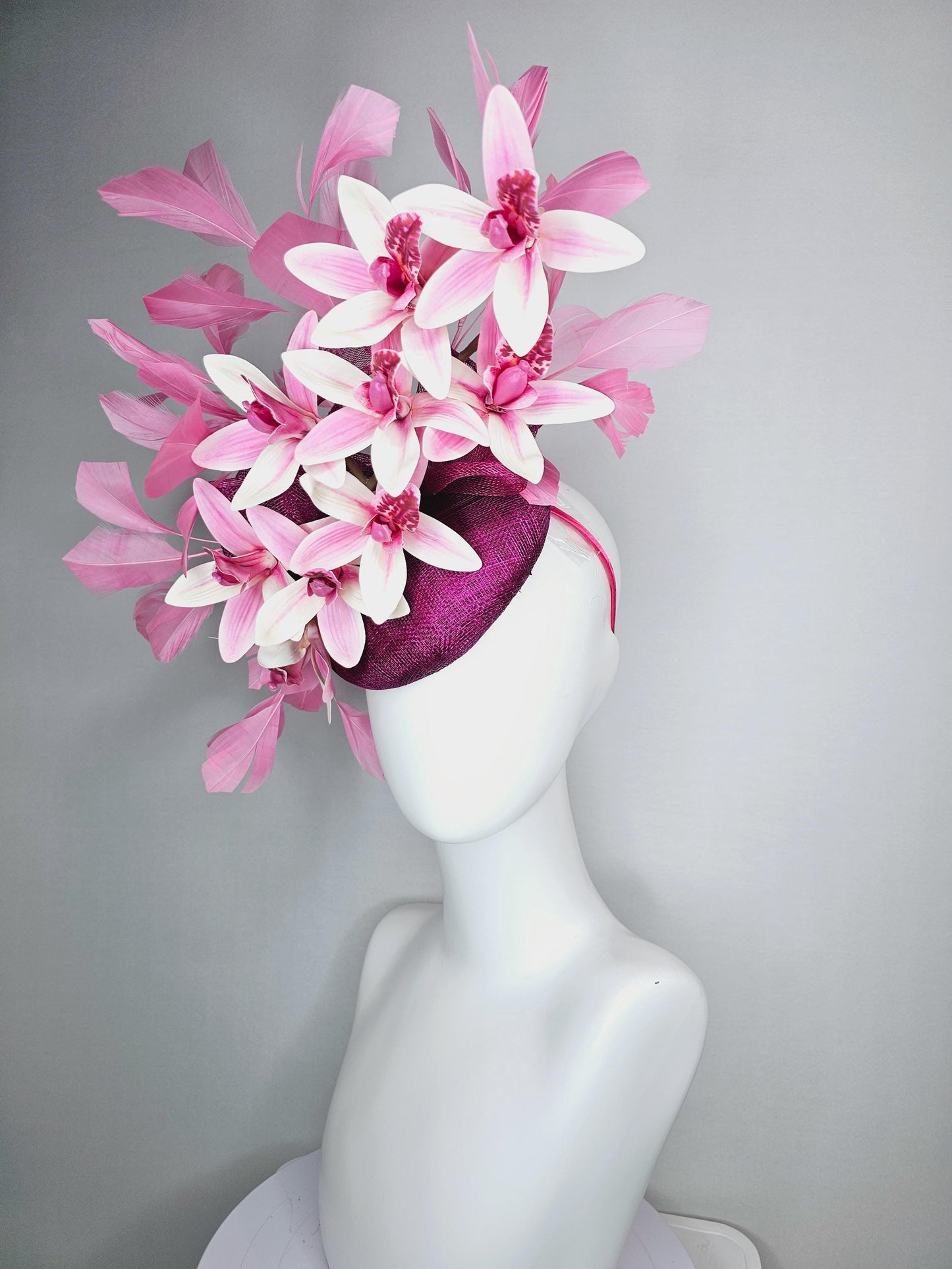 kentucky derby hat fascinator magenta purple sinamay with bow and white and pink satin orchid flowers with blush pink branching feathers