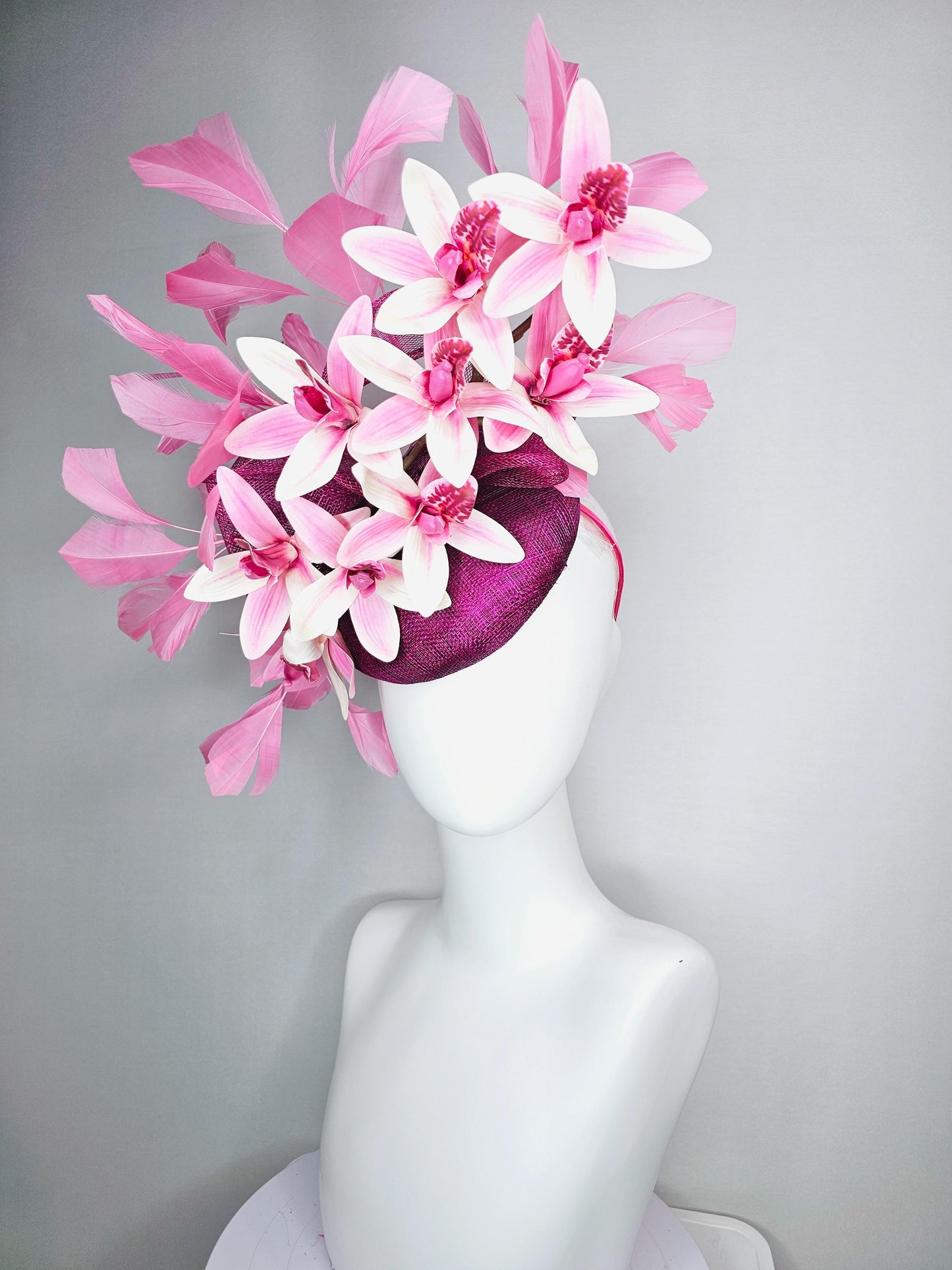 kentucky derby hat fascinator magenta purple sinamay with bow and white and pink satin orchid flowers with blush pink branching feathers