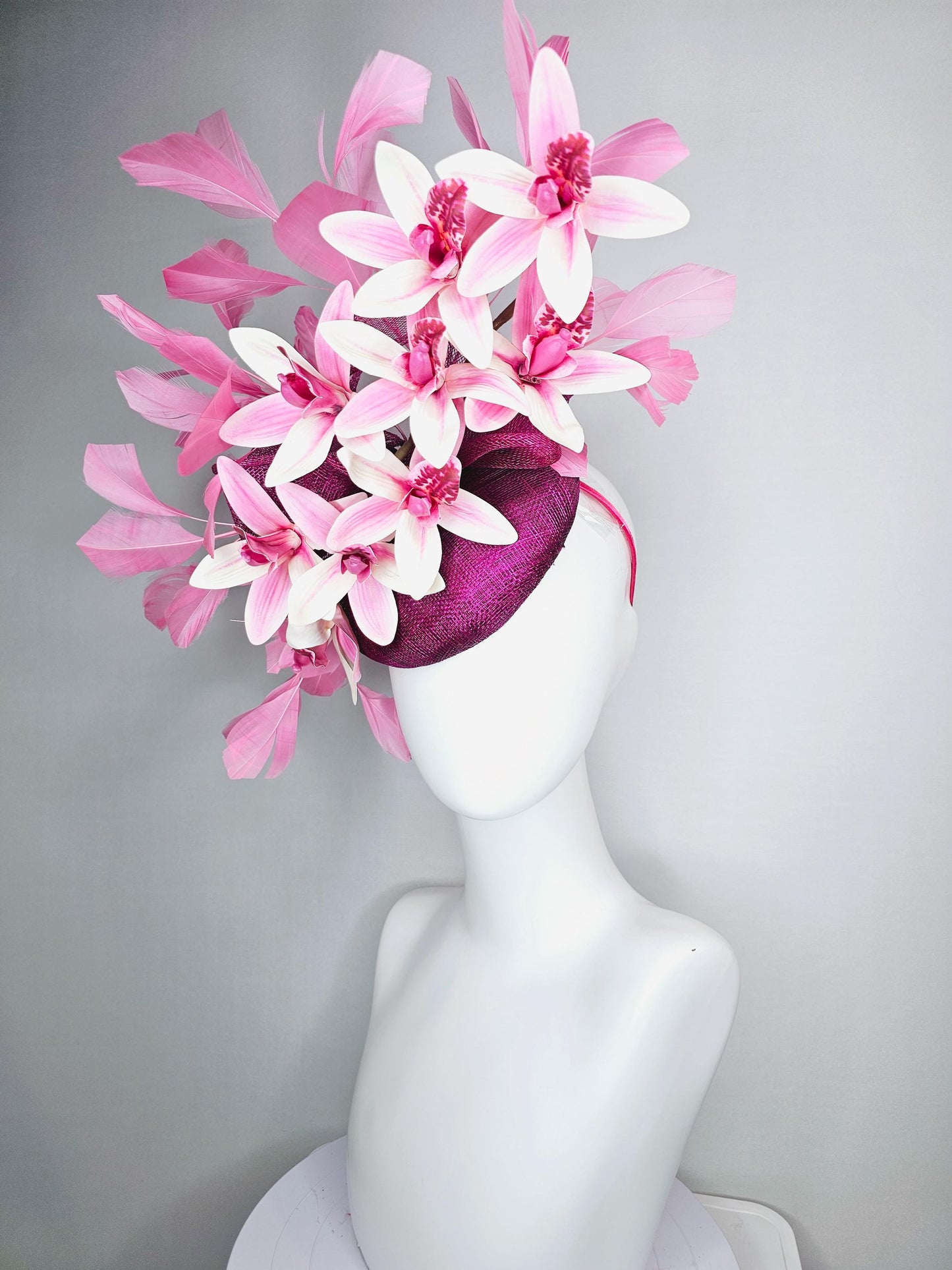 kentucky derby hat fascinator magenta purple sinamay with bow and white and pink satin orchid flowers with blush pink branching feathers